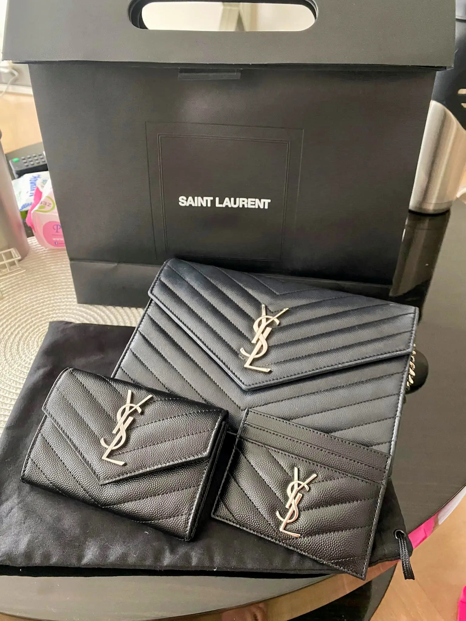 1-year review on the YSL card holder #yvessaintlaurent #ysl