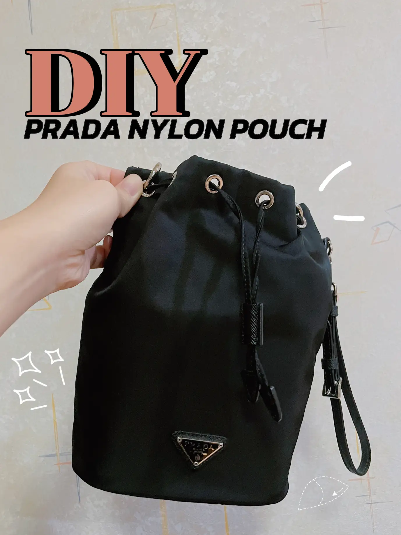 Prada nylon bucket pouch hot sale