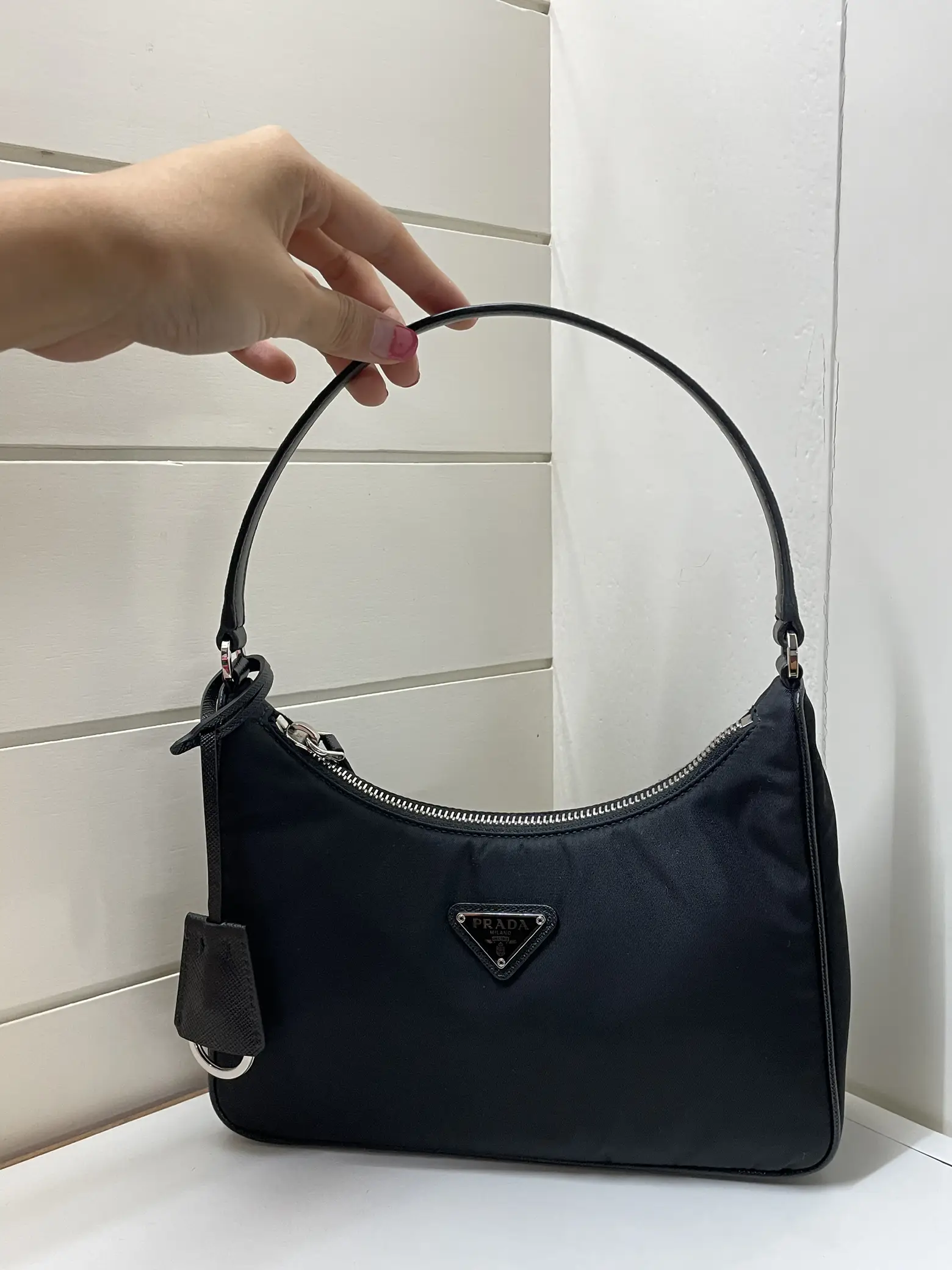 Prada logo best sale plaque mini bag