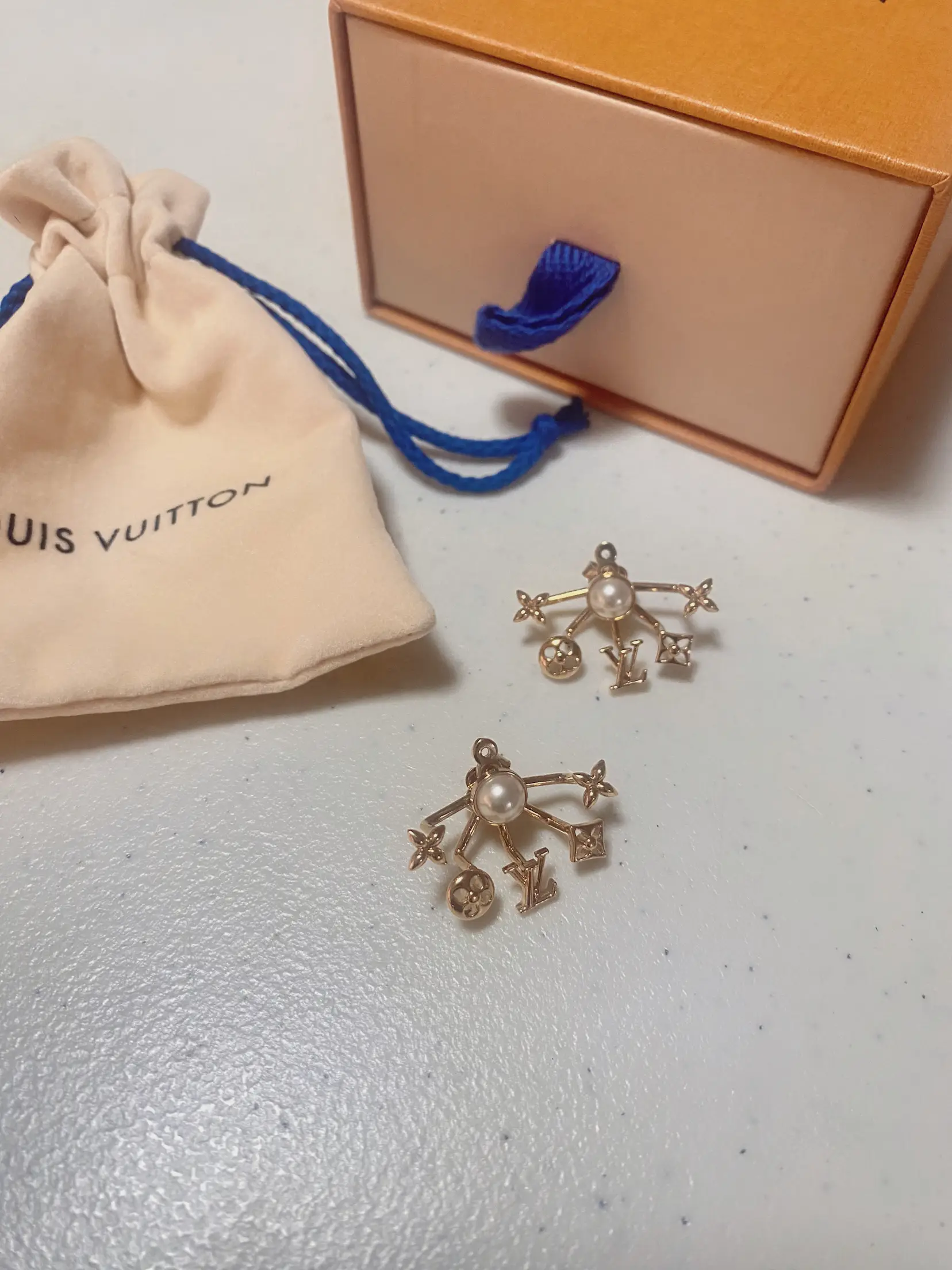 LOUIS VUITTON, a pir of 'Love letter' earrings and a necklace