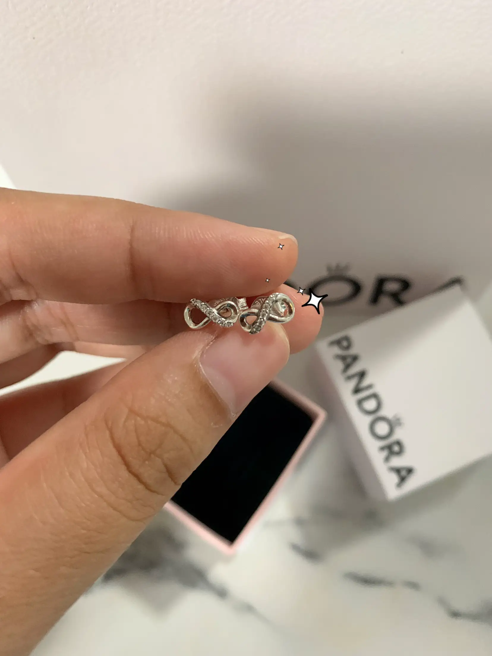 Infinite love hot sale pandora earrings