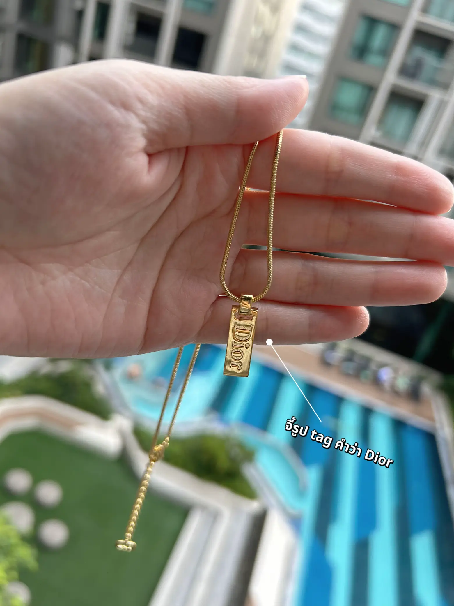 Dior necklace 2024 gold tag