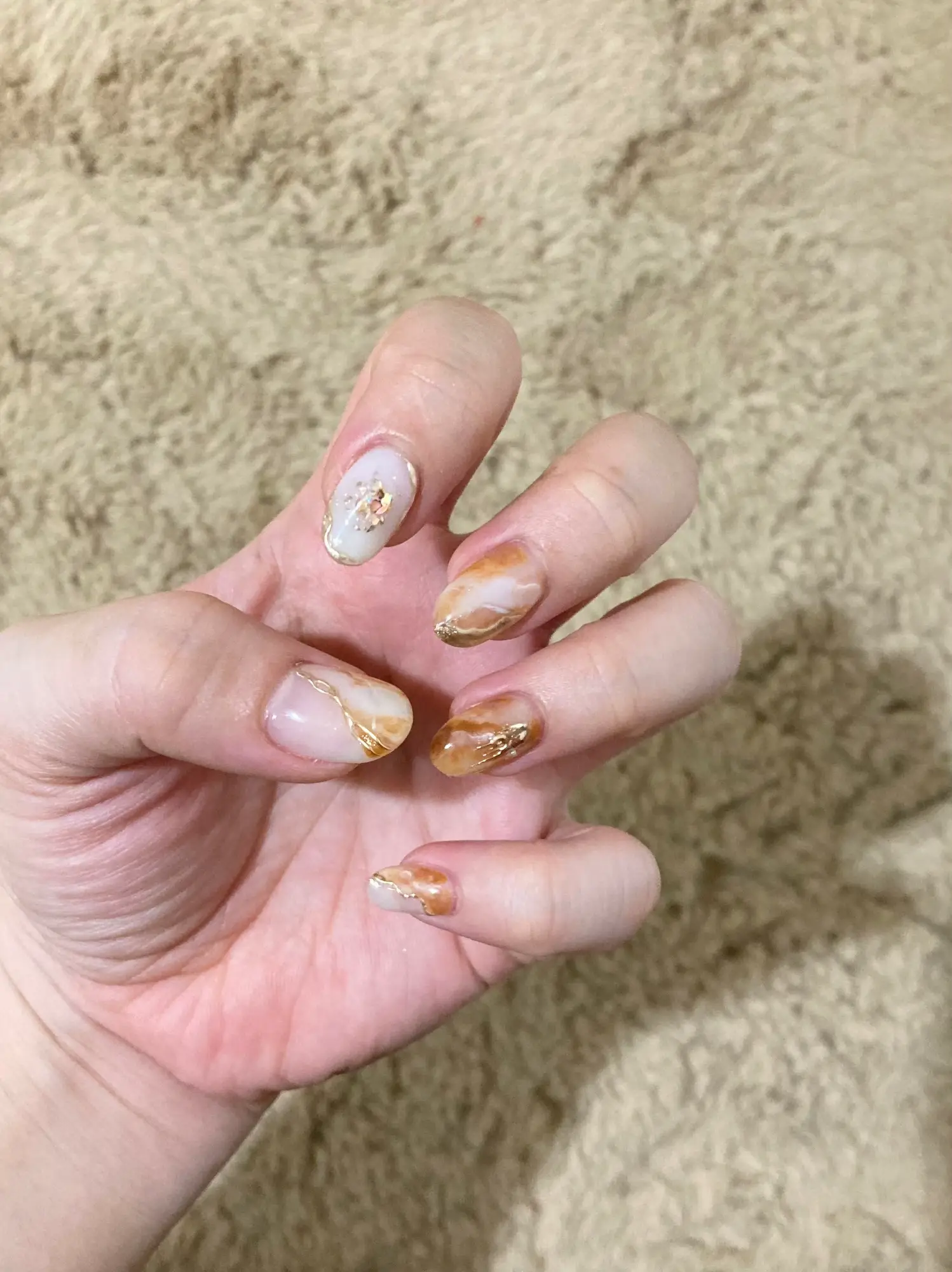 Marble effect with blooming gel and gold foil, took hours but I