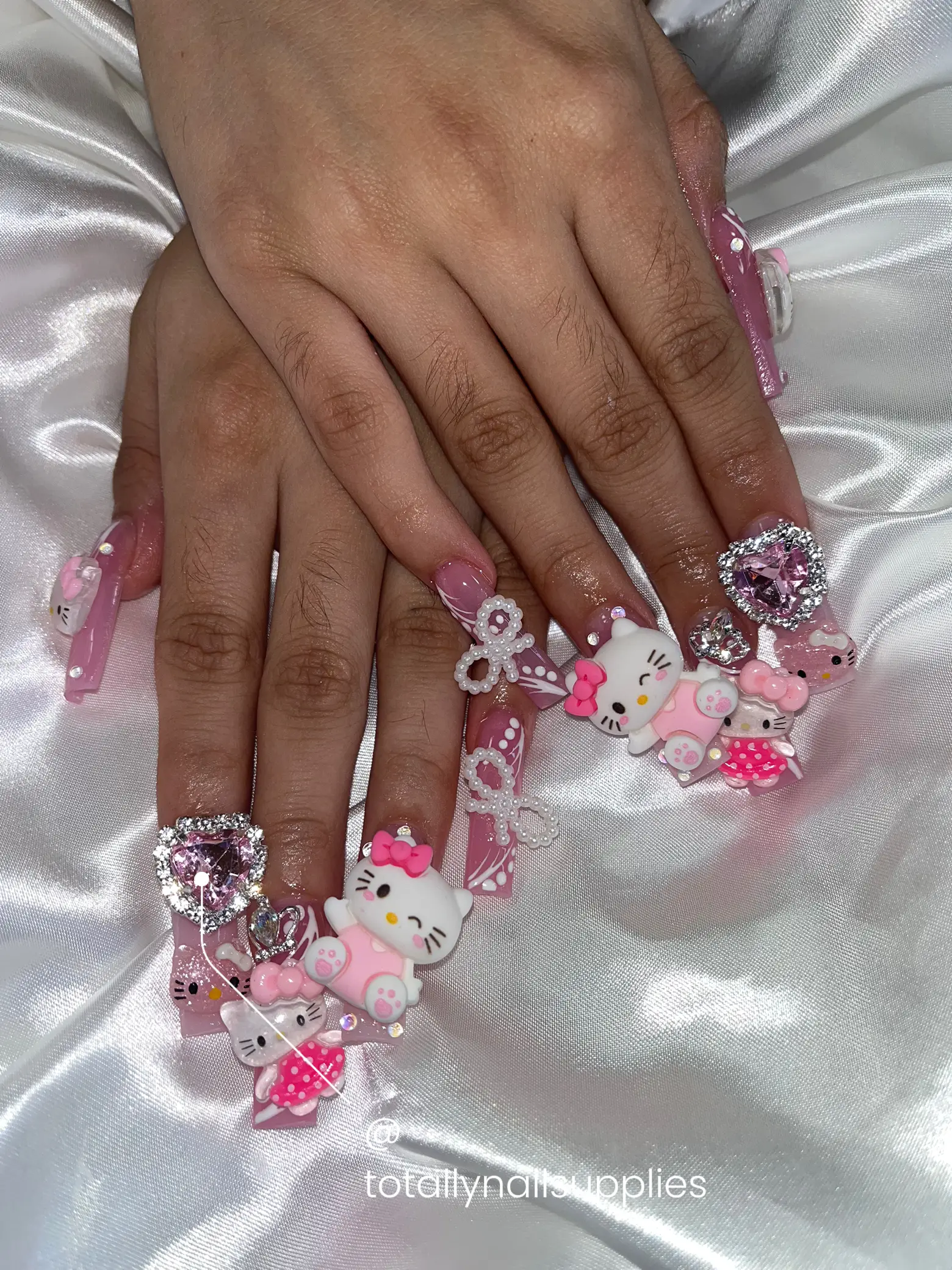 Hello kitty nails in 2023  Hello kitty nails, Pink acrylic nails, Bling  acrylic nails