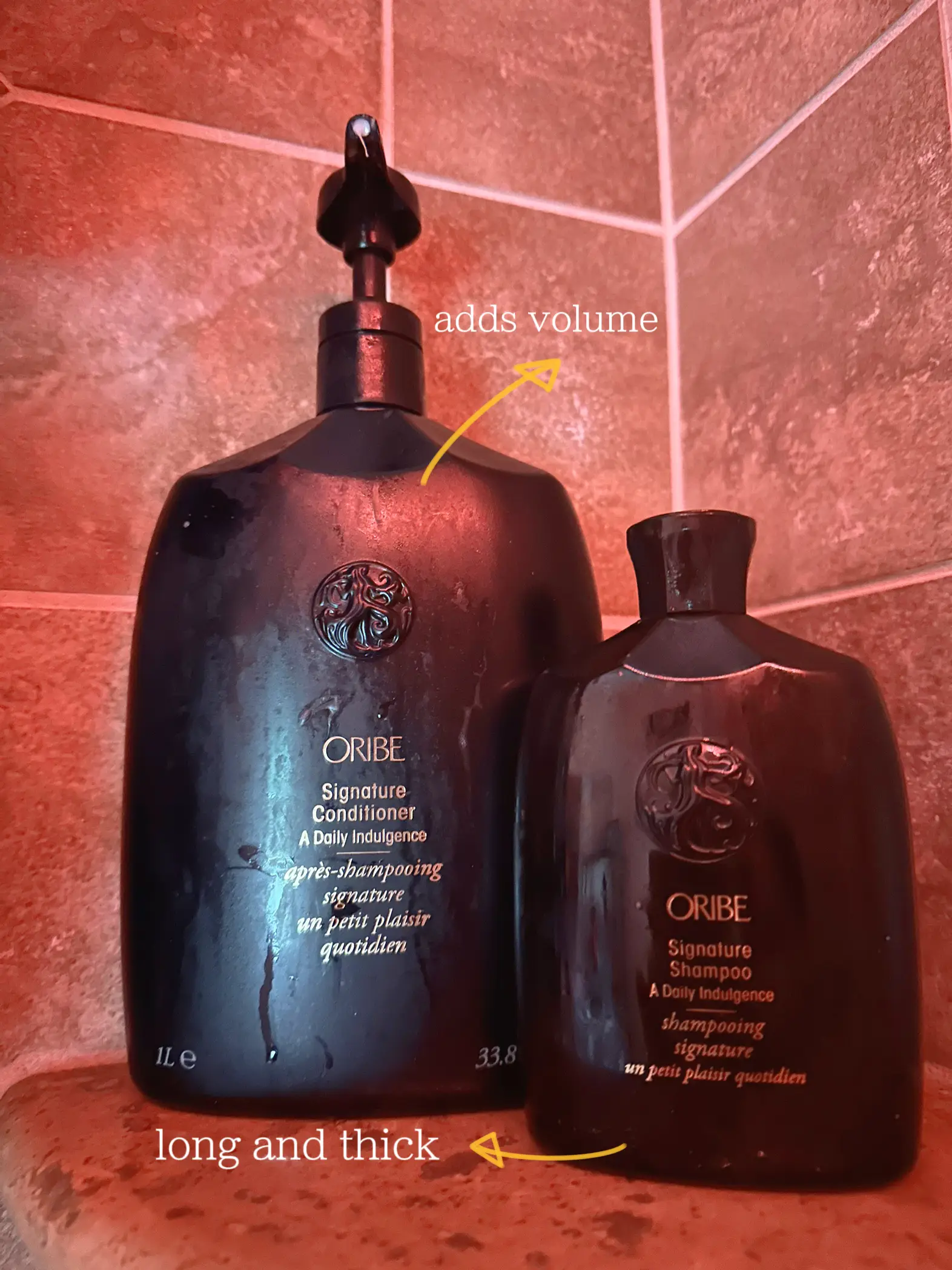  Two bottles of ORIBE hair care