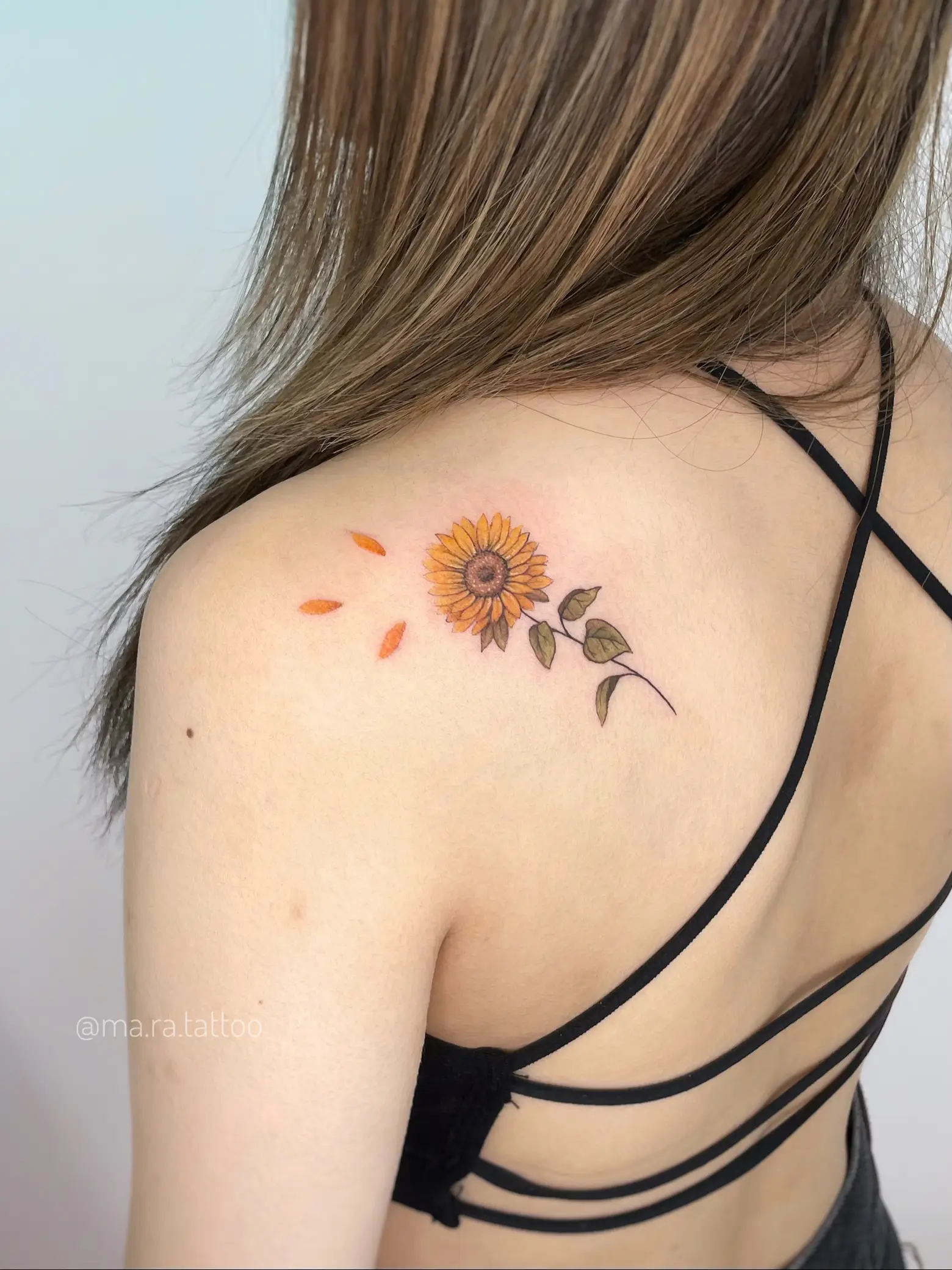 flower shoulder blade tattoos for women