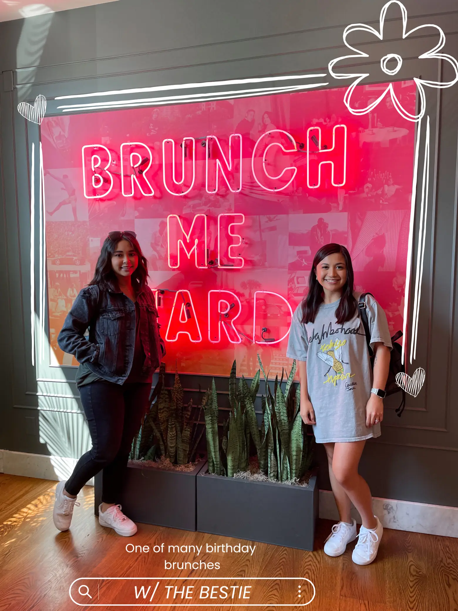  Two women are standing in front of a neon sign that says "Brunch Me".