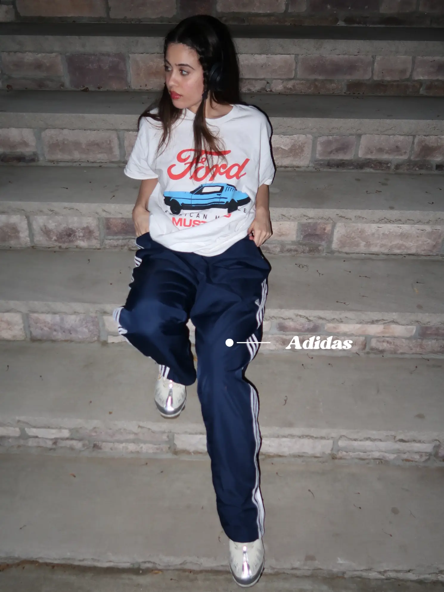 Girl wearing adidas on sale pants