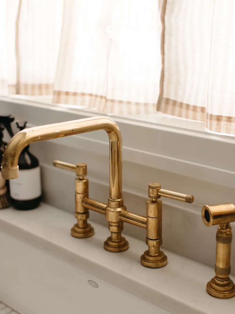 Yes, unlacquered brass will agebut in the very best way. The patina on  our Easton faucet in a…