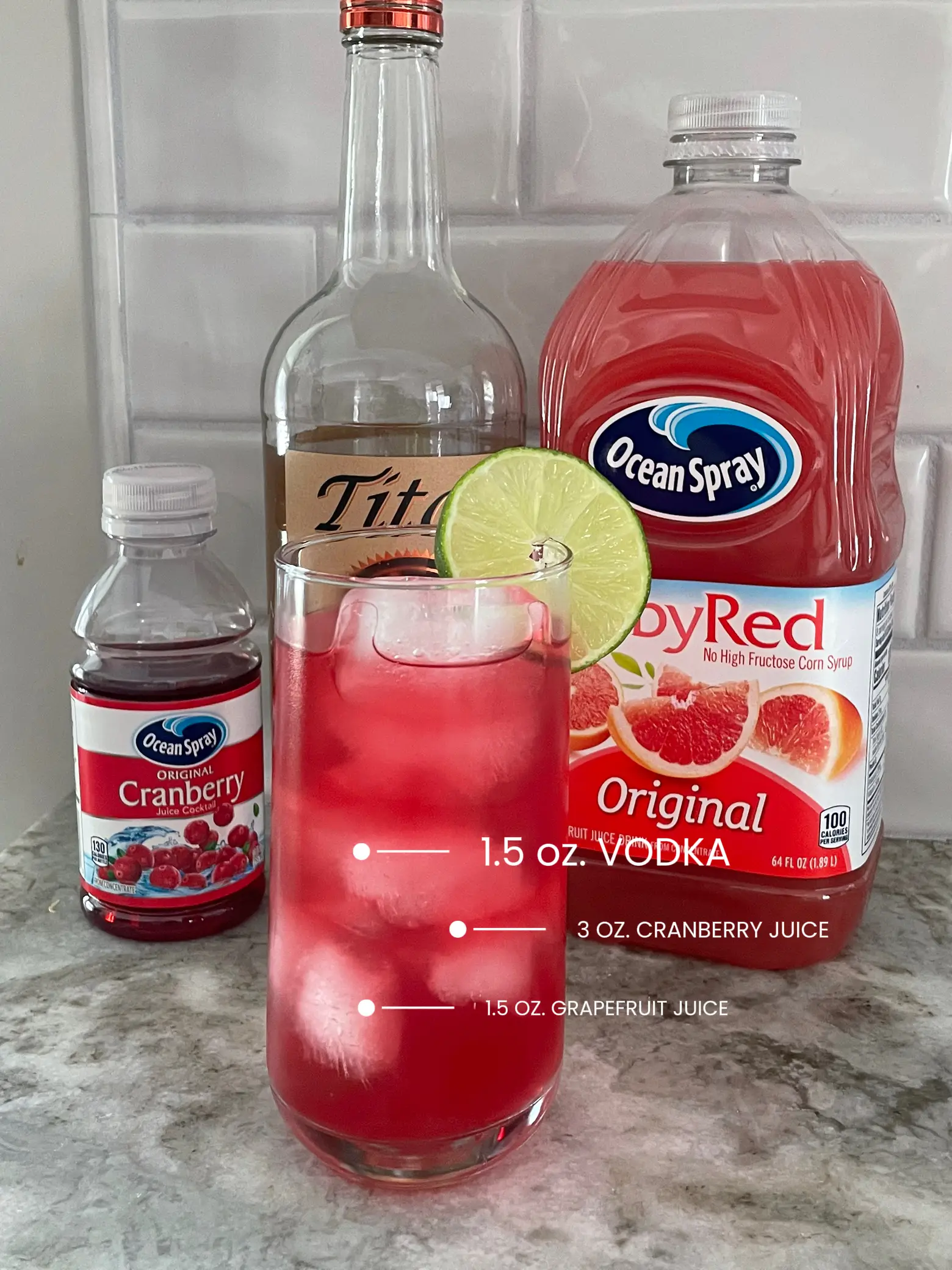 A bottle of vodka, a bottle of cranberry juice, and a bottle of grapefruit juice