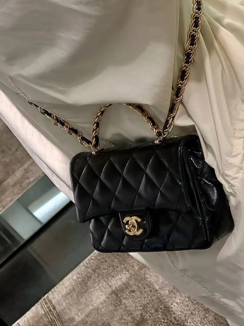 Chanel Lambskin Quilted Small Circular Handle Bag Black