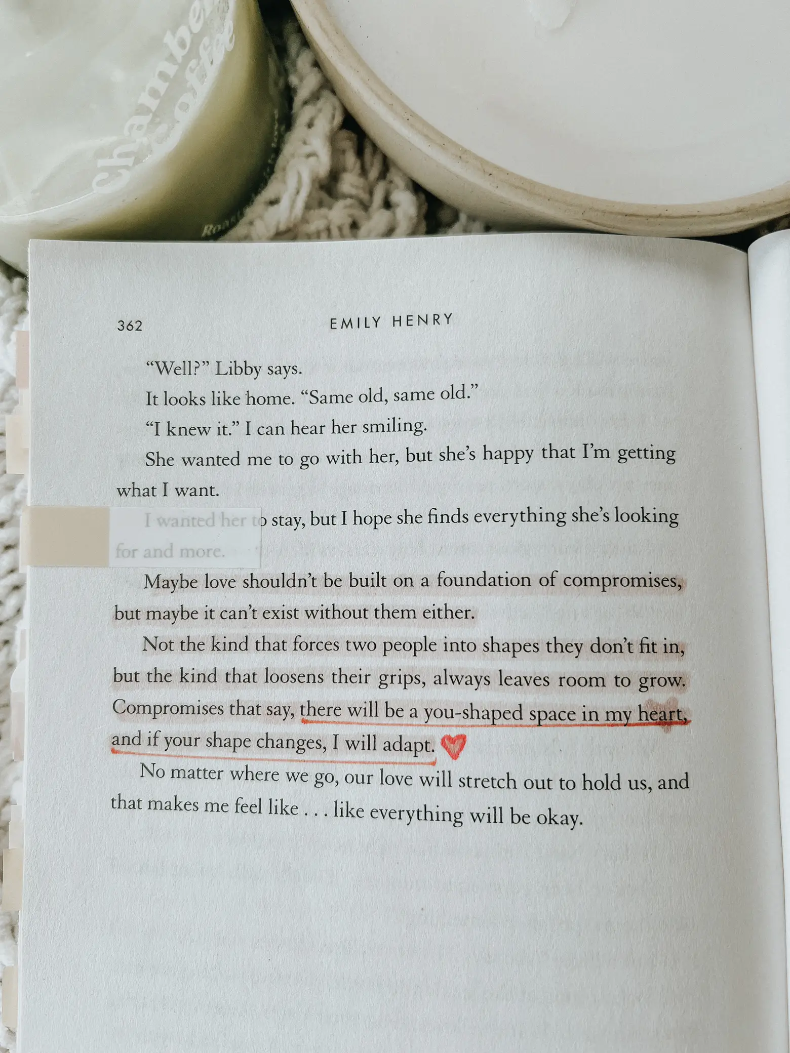  A book is open to a page with a highlighted paragraph.