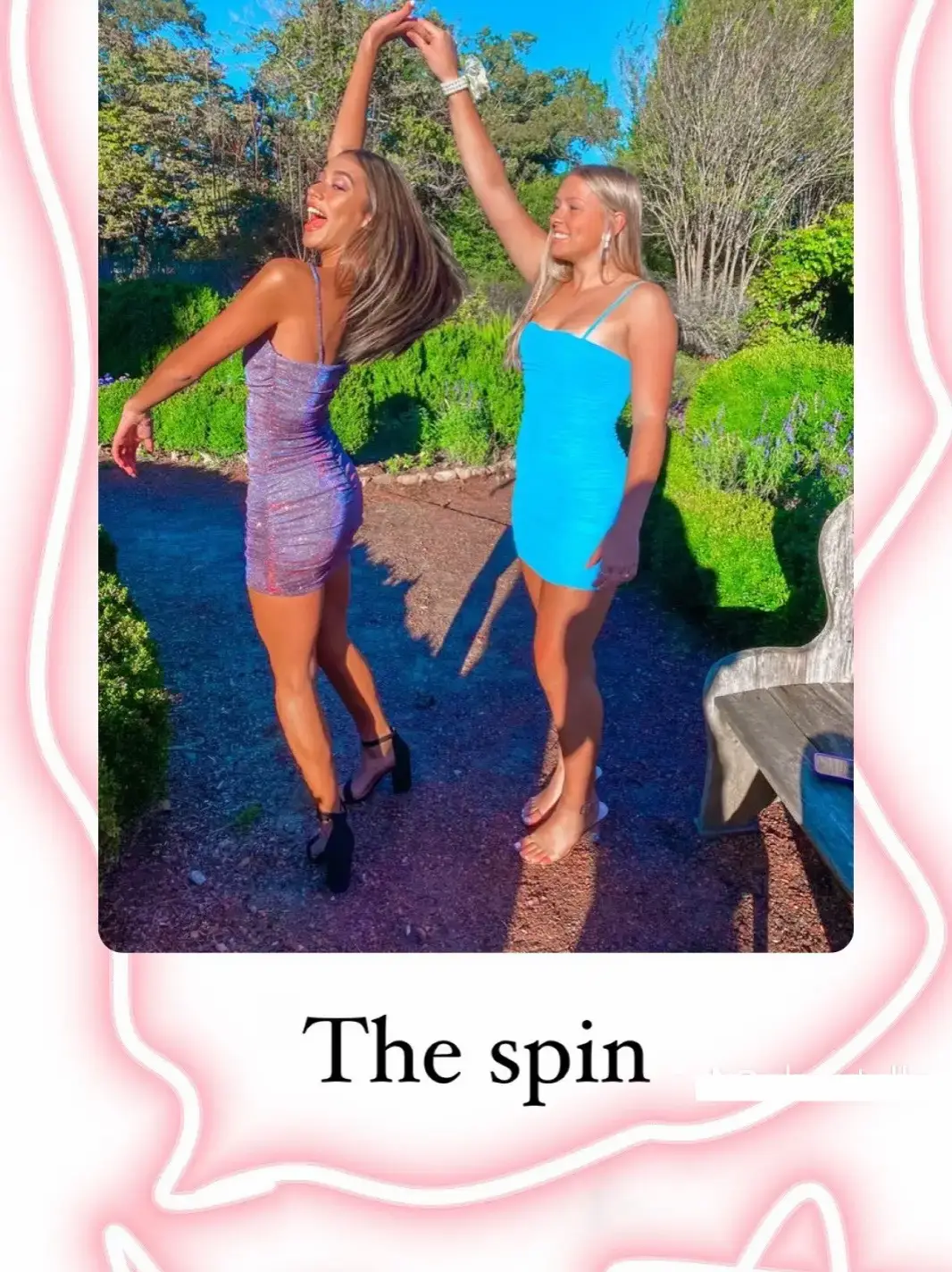  Two women are standing in a field, one wearing a xanh rớt dress and the other wearing a red dress. They are both wearing sandals and are smiling. The image is titled "The spin."