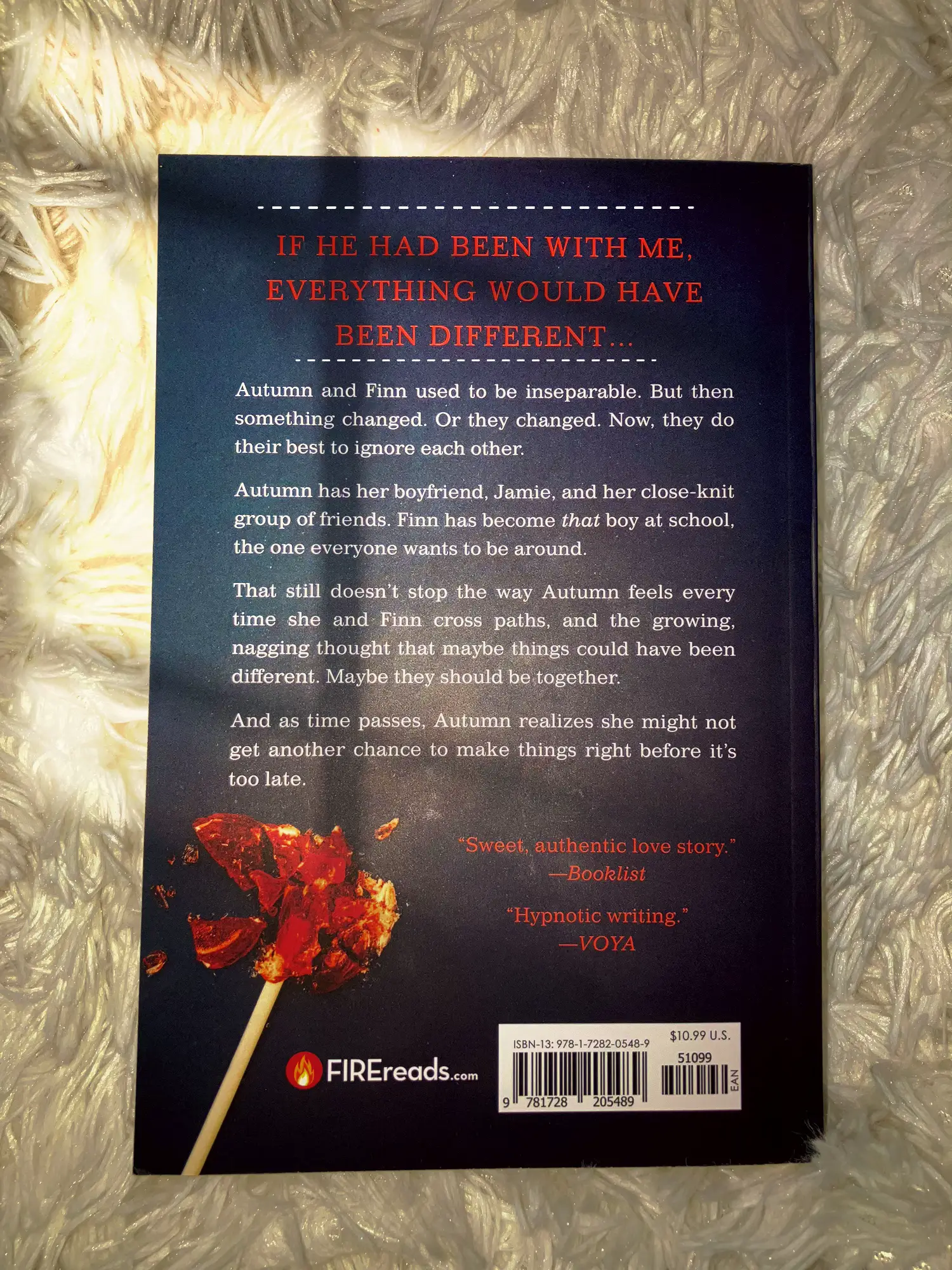  "If he had been with me, everything would have been different". A book cover with a flame on it.