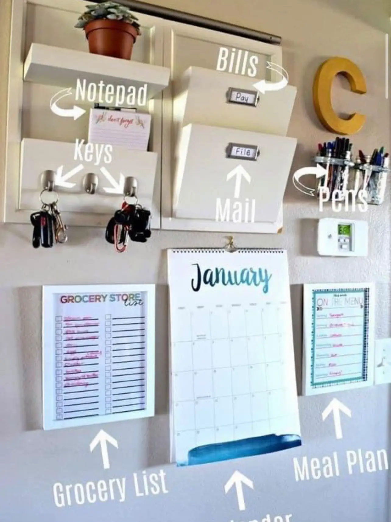  A calendar with a shopping list above it.