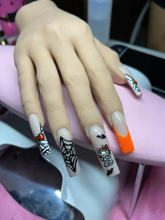 Hello Kitty Halloween nail design - SoNailicious