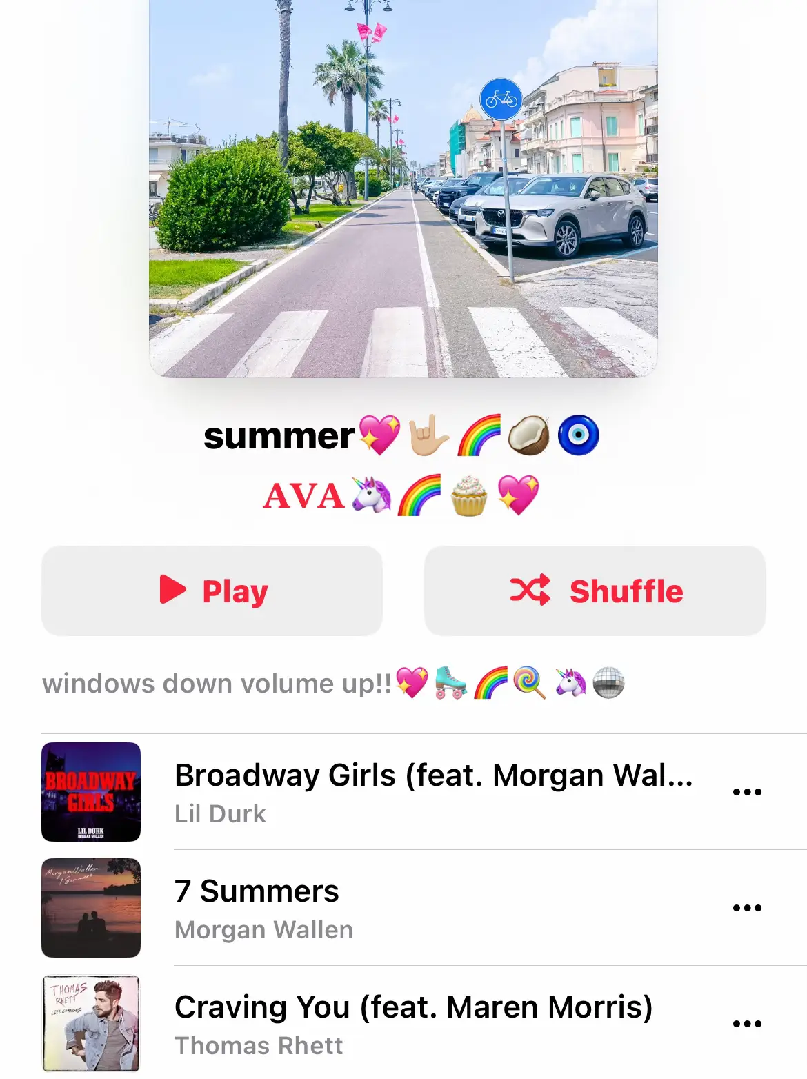  A list of songs with a picture of a road and a car