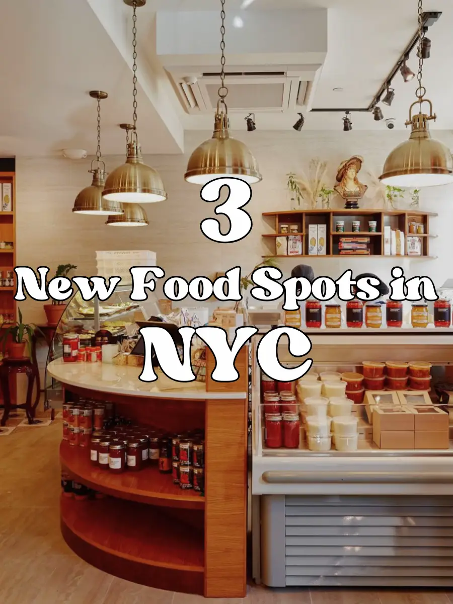  A store with a wooden counter and a sign that says "3 New Food Spots in NYC".