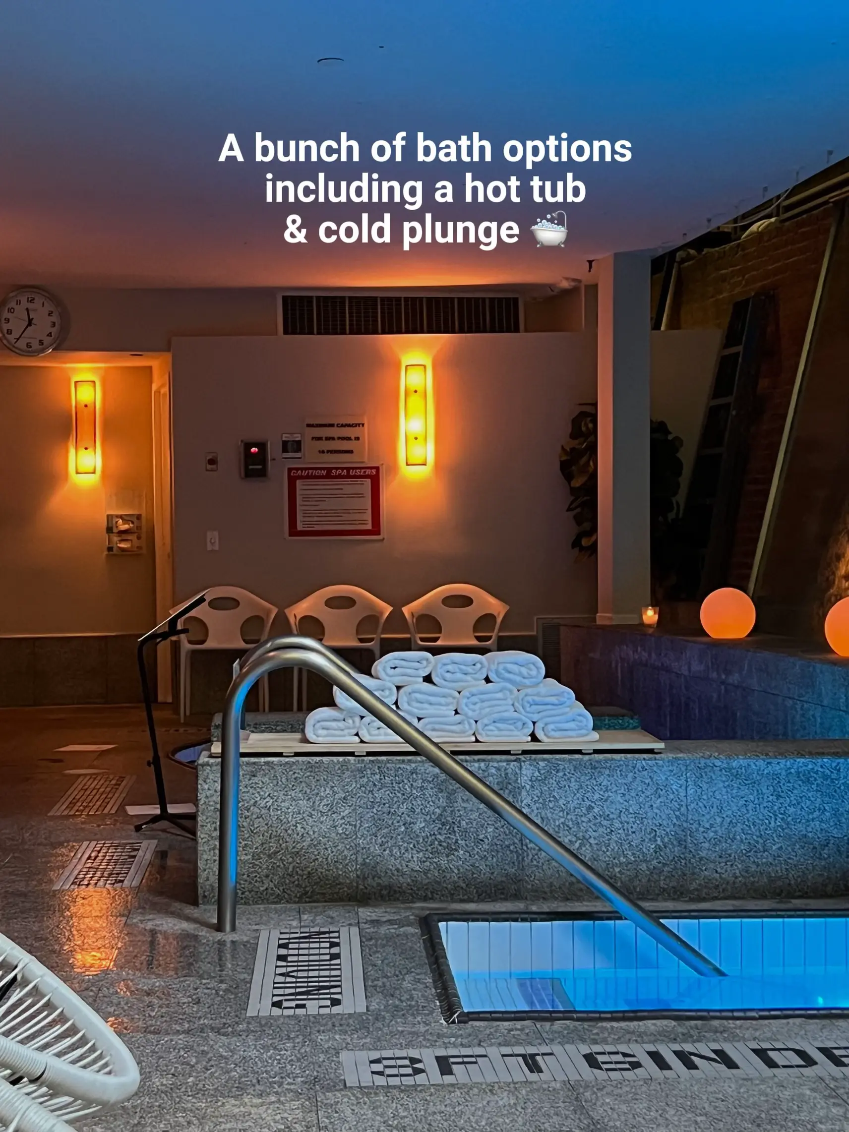  A hotel room with a hot tub and a cold plunge.