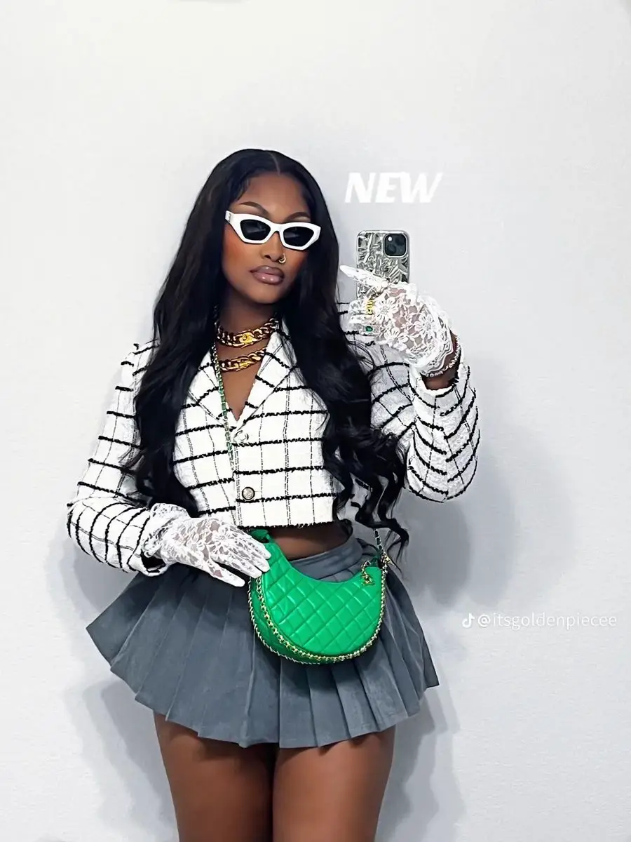 The top green worn by Manon D in the  video TRY ON HAUL SHEIN