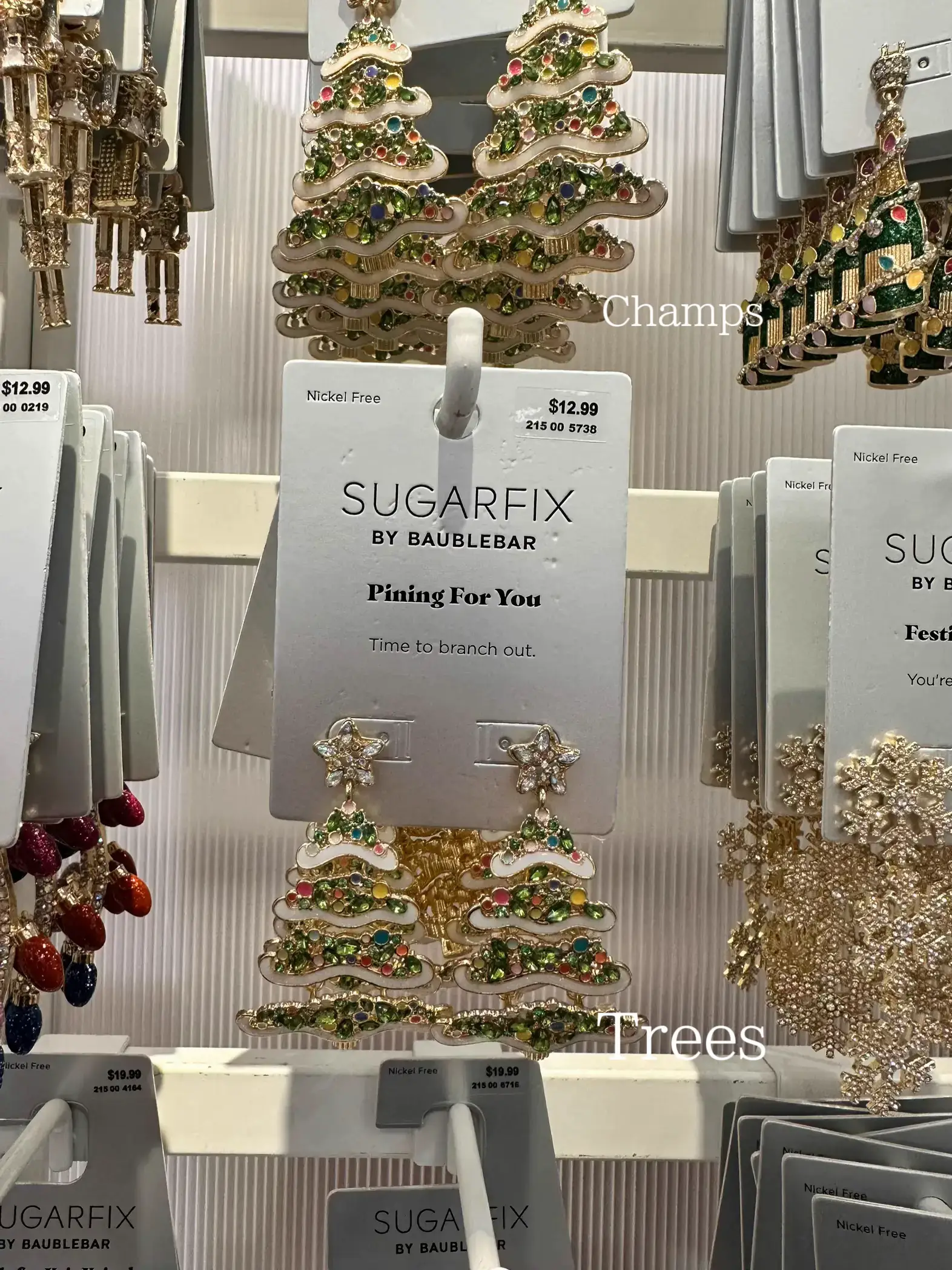  A display of Christmas ornaments and trees.