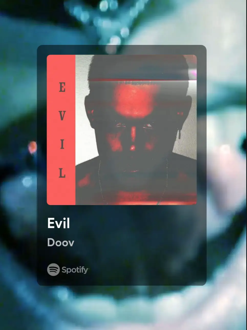  A Spotify playlist with a picture of a man's face on it.