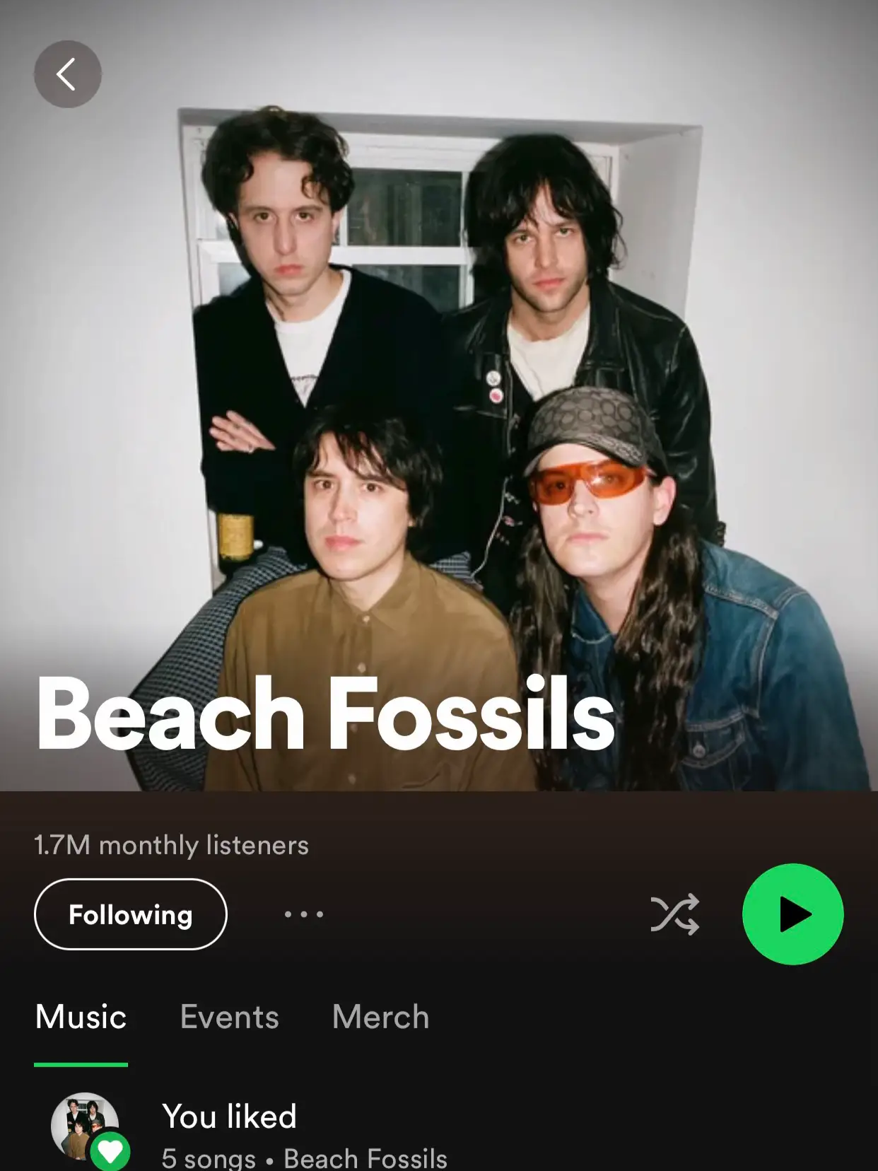  A picture of a band with the words "B Beach Fossils" on it.