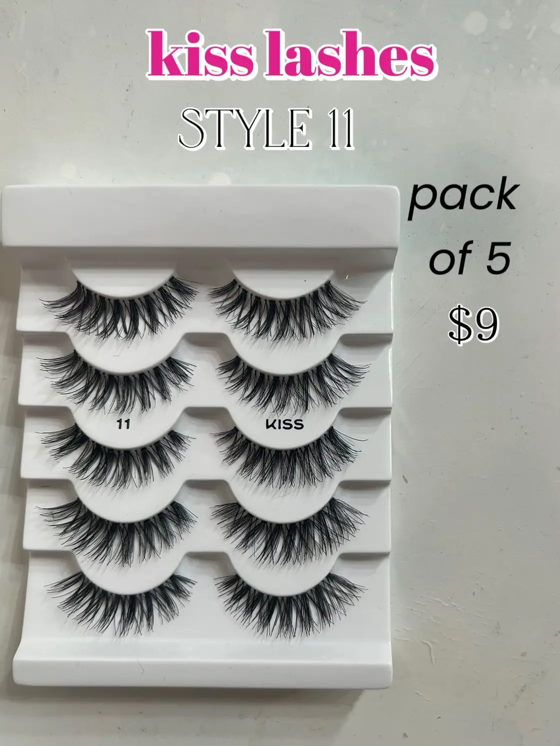  A pack of 5 white lashes with a price of $9.