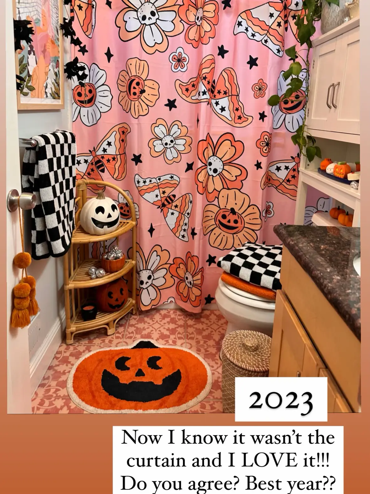  A bathroom with a checkered curtain and a pumpkin rug.