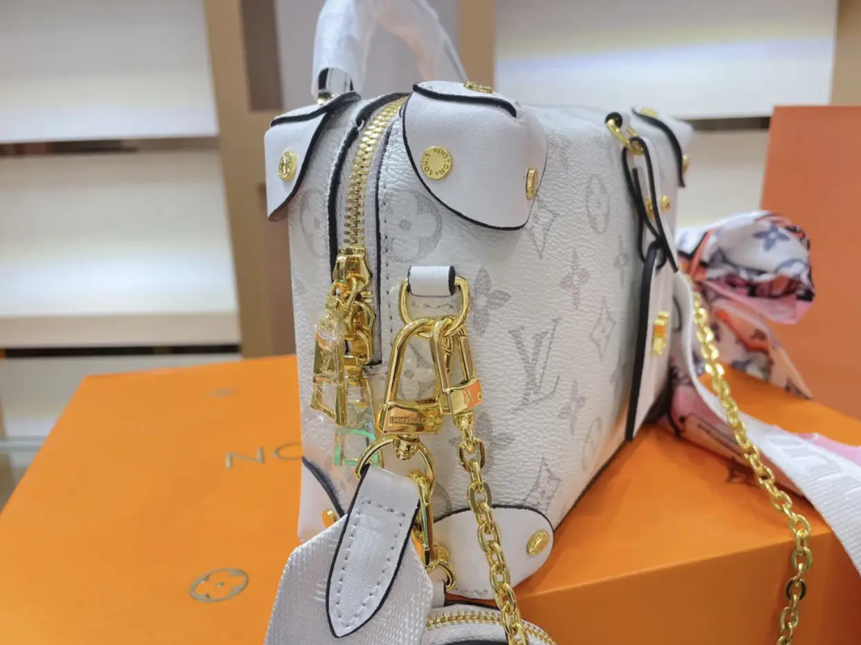 A History of Louis Vuitton's Papillon Bag - Pretty Simple Bags