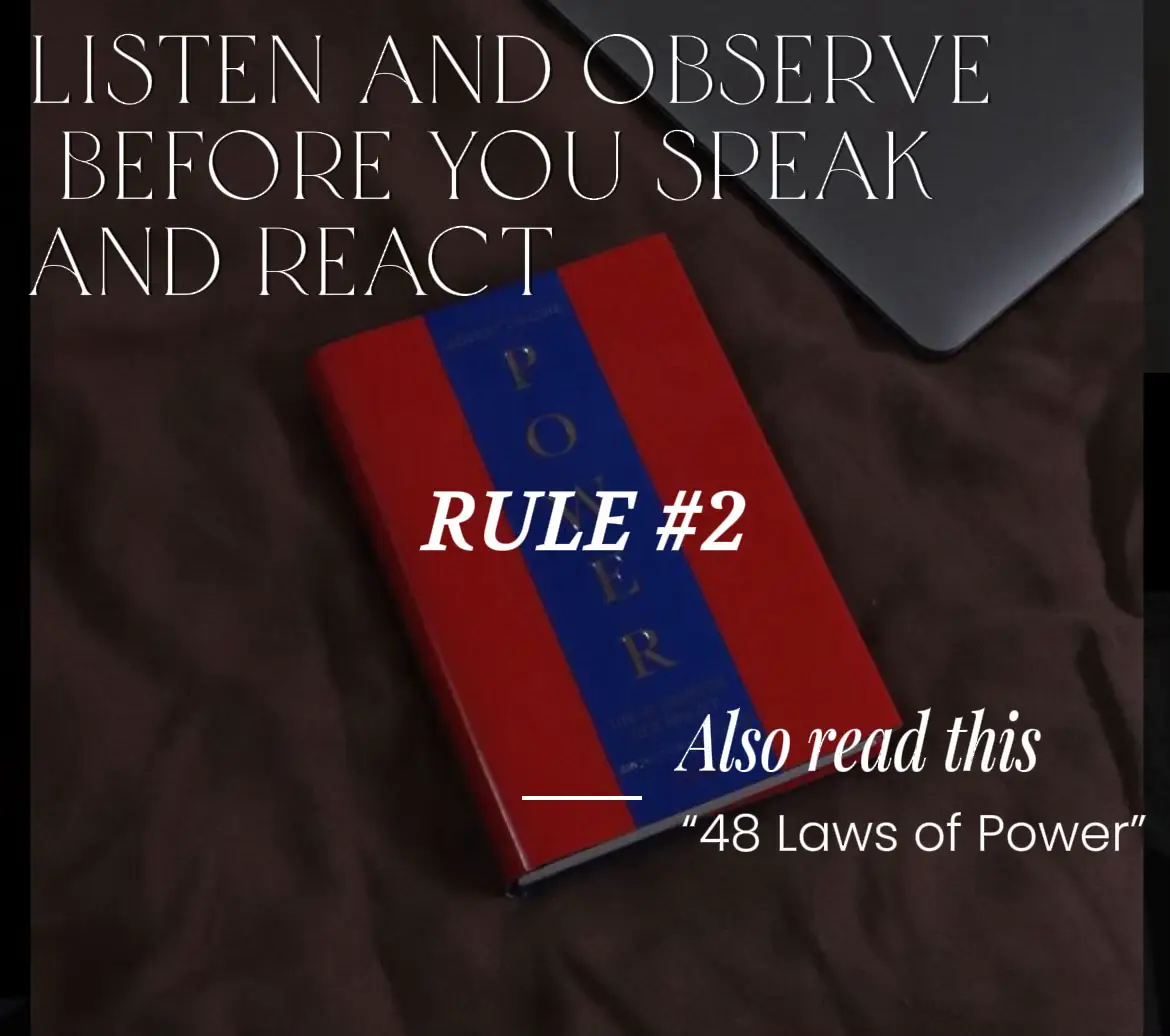  A book titled "48 Laws of Power" is laying on a bed.