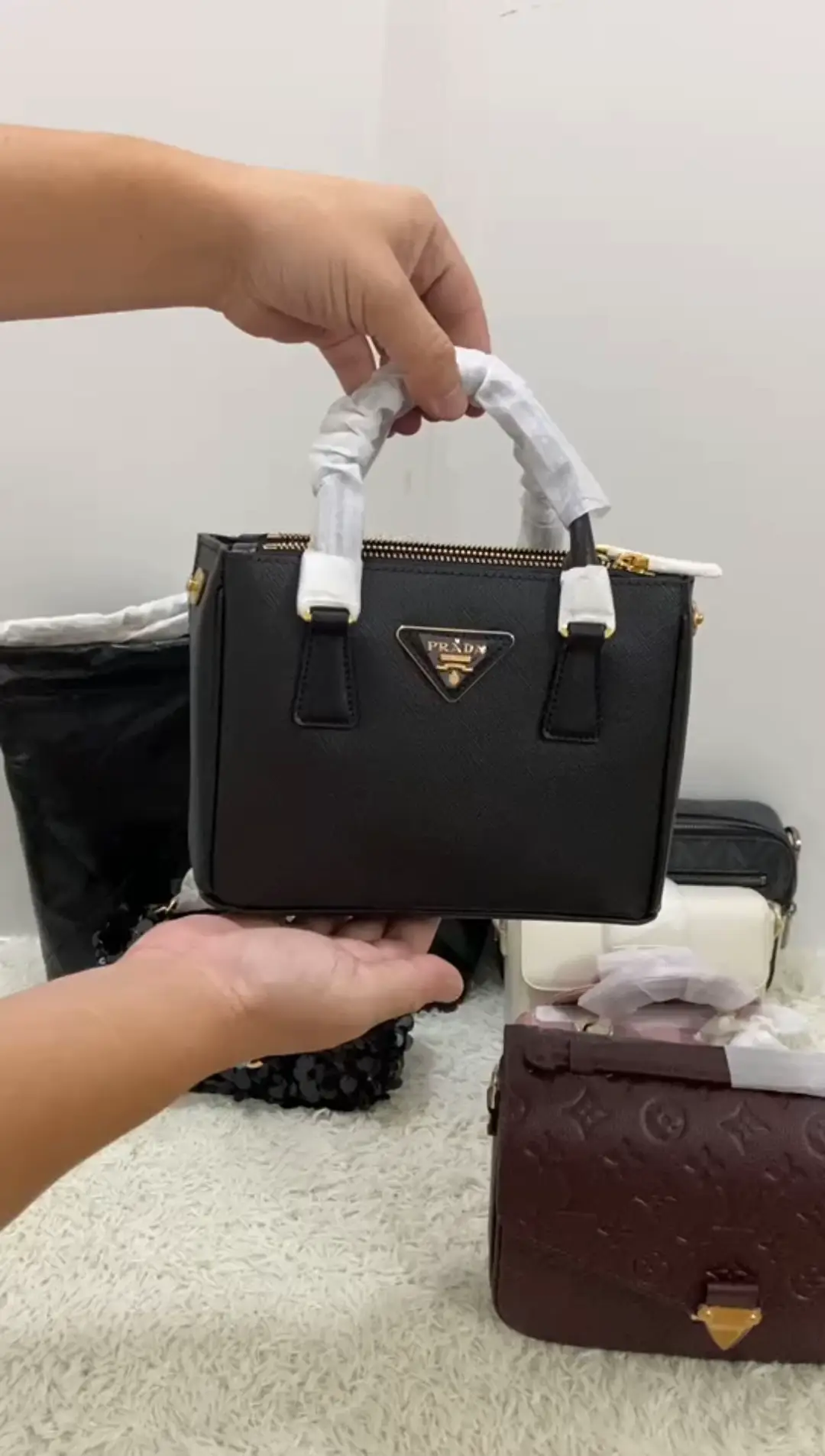 Designer Bag Review, Prada Re-Edition 2005, Video published by  DanielleGervino