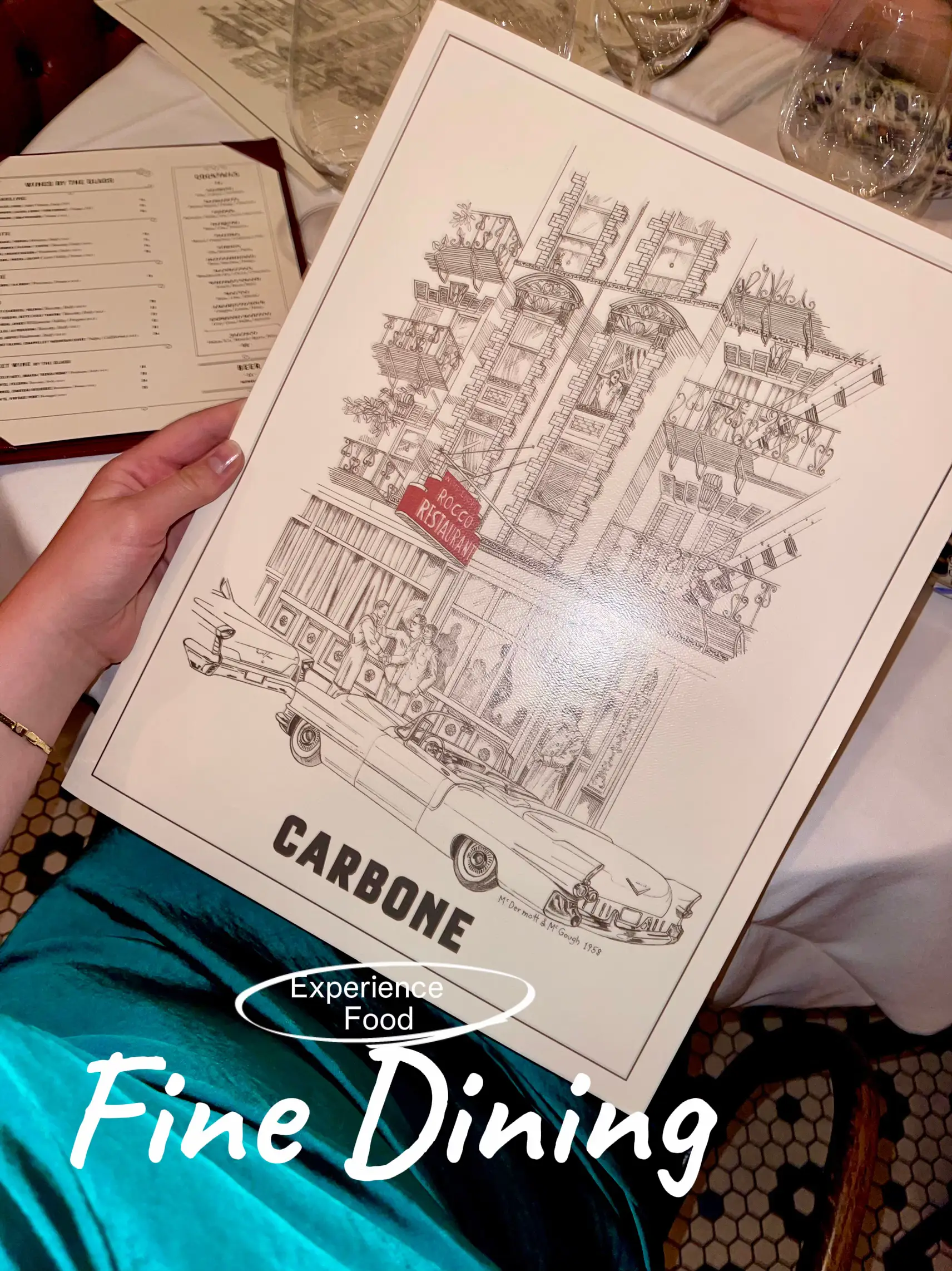  A person is holding a map of a city with the words "Experience Food Dining Fine" on top.