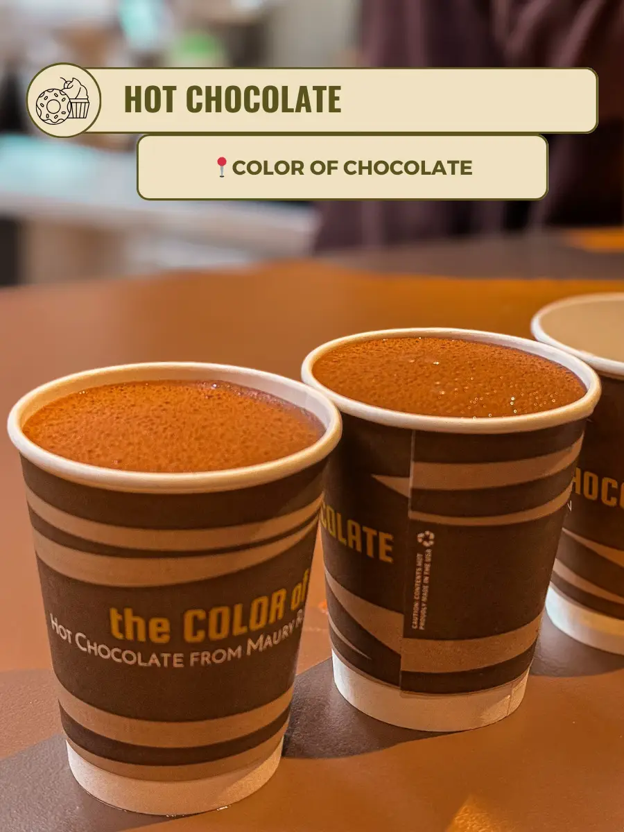  Three cups of hot chocolate with a color of chocolate drizzle.