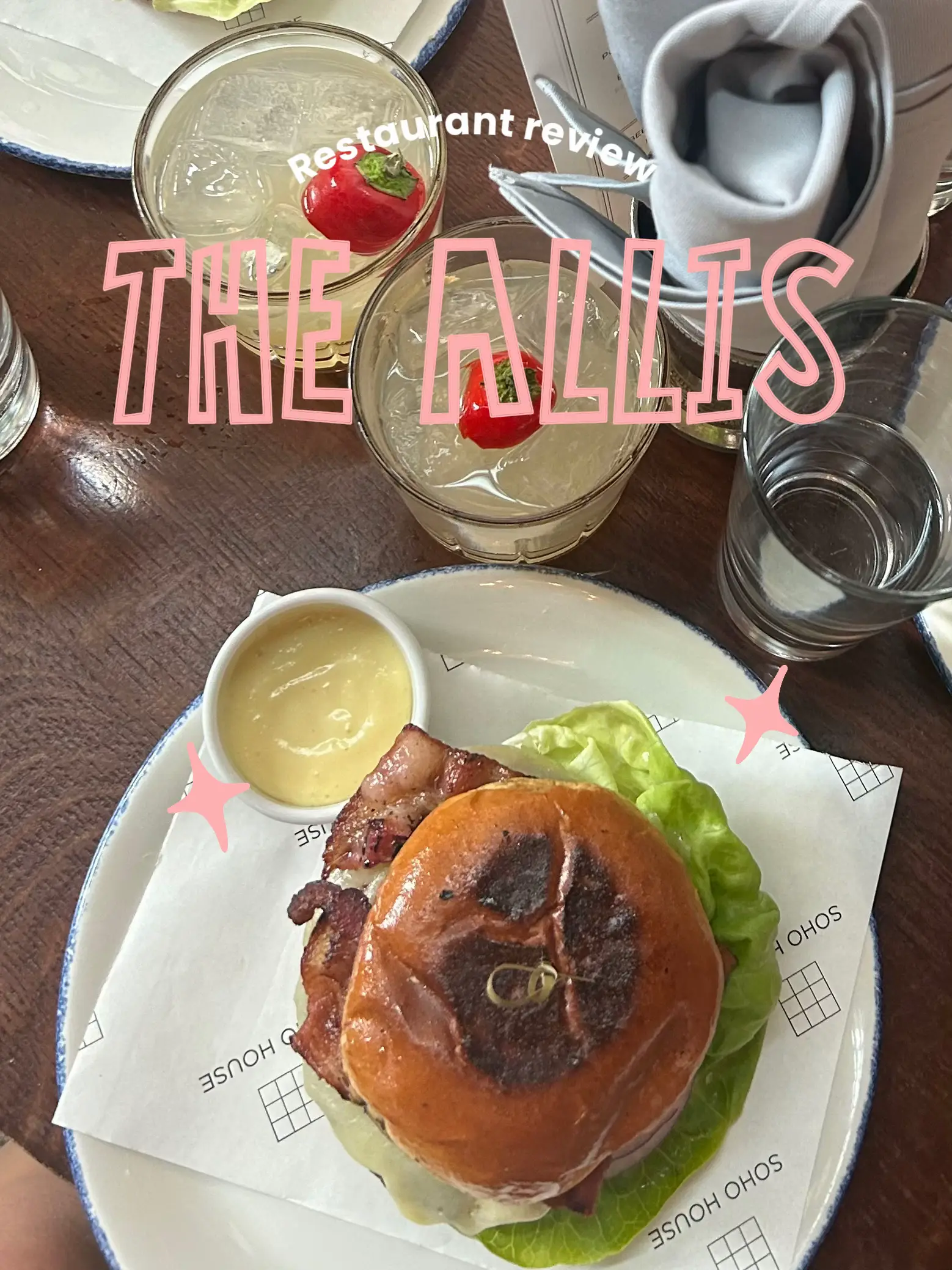 A plate of food with the words "The Allis Soho House" on it.