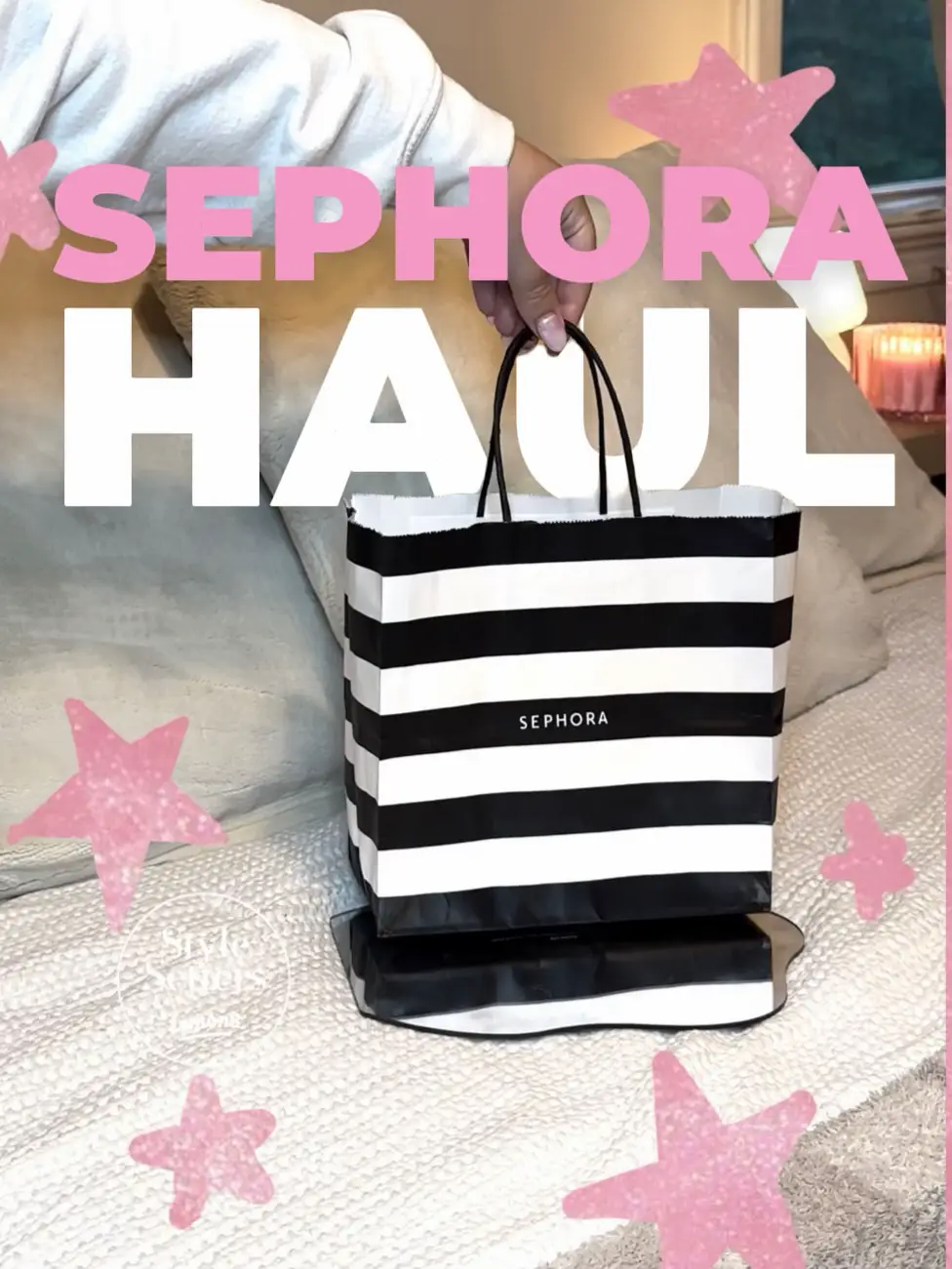  A black and white bag with the word SEPHORA on it.