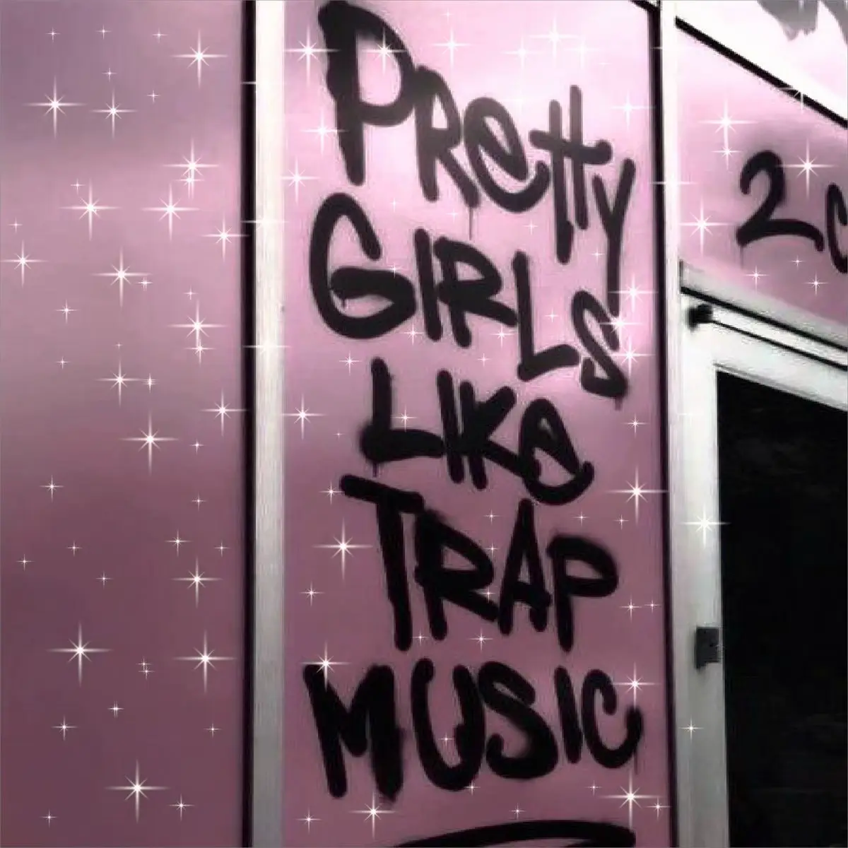  A grafiti on a wall that says "pretty girls like music".