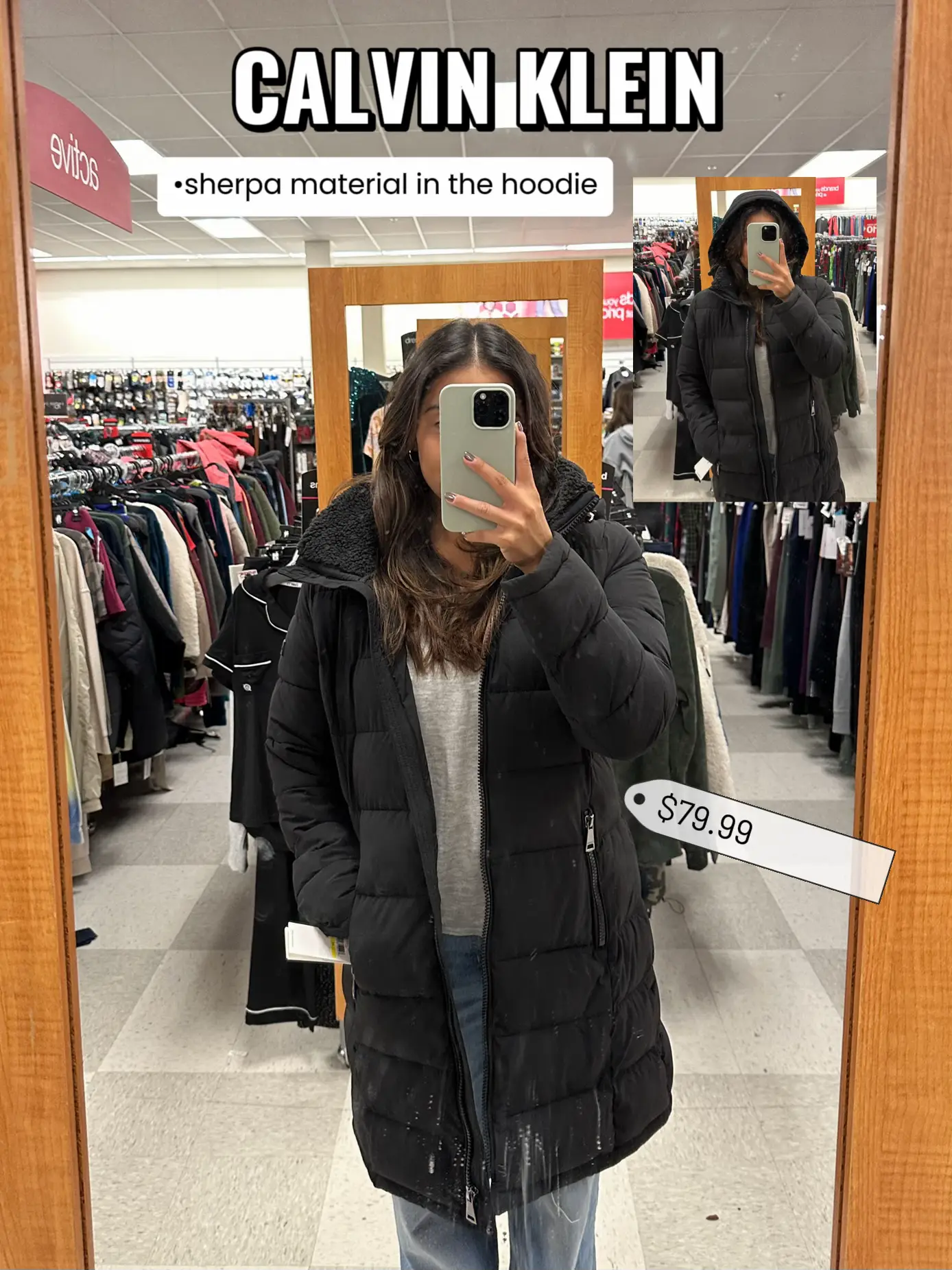  A woman is taking a selfie in a store.