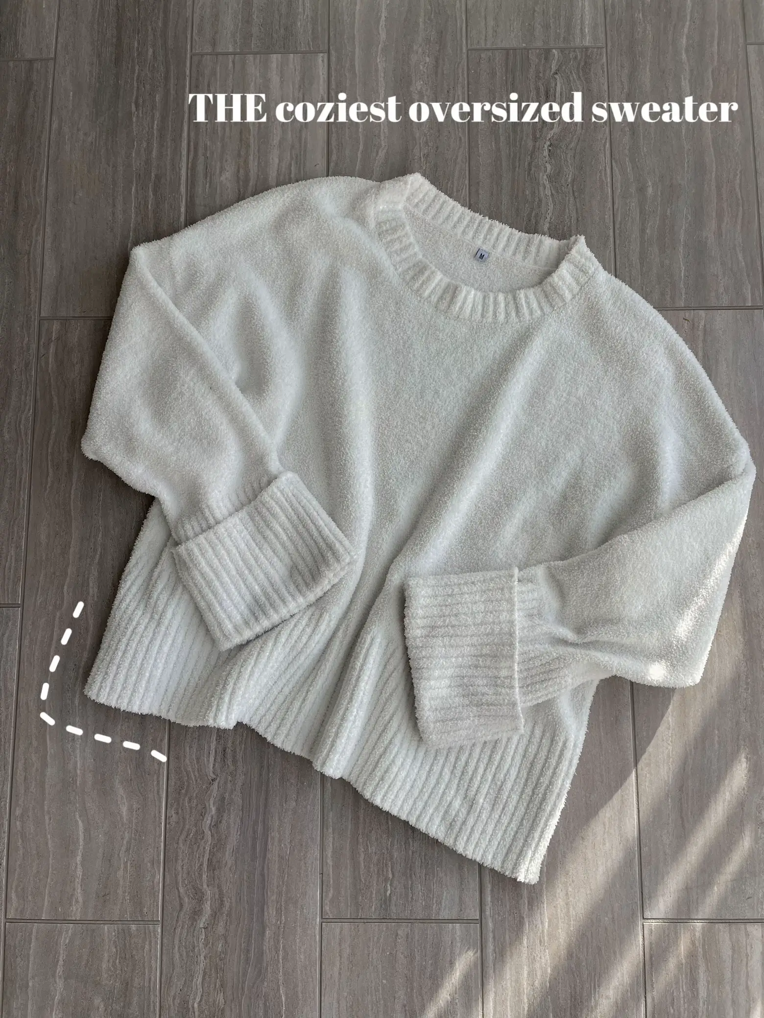  A white sweater with a pattern.