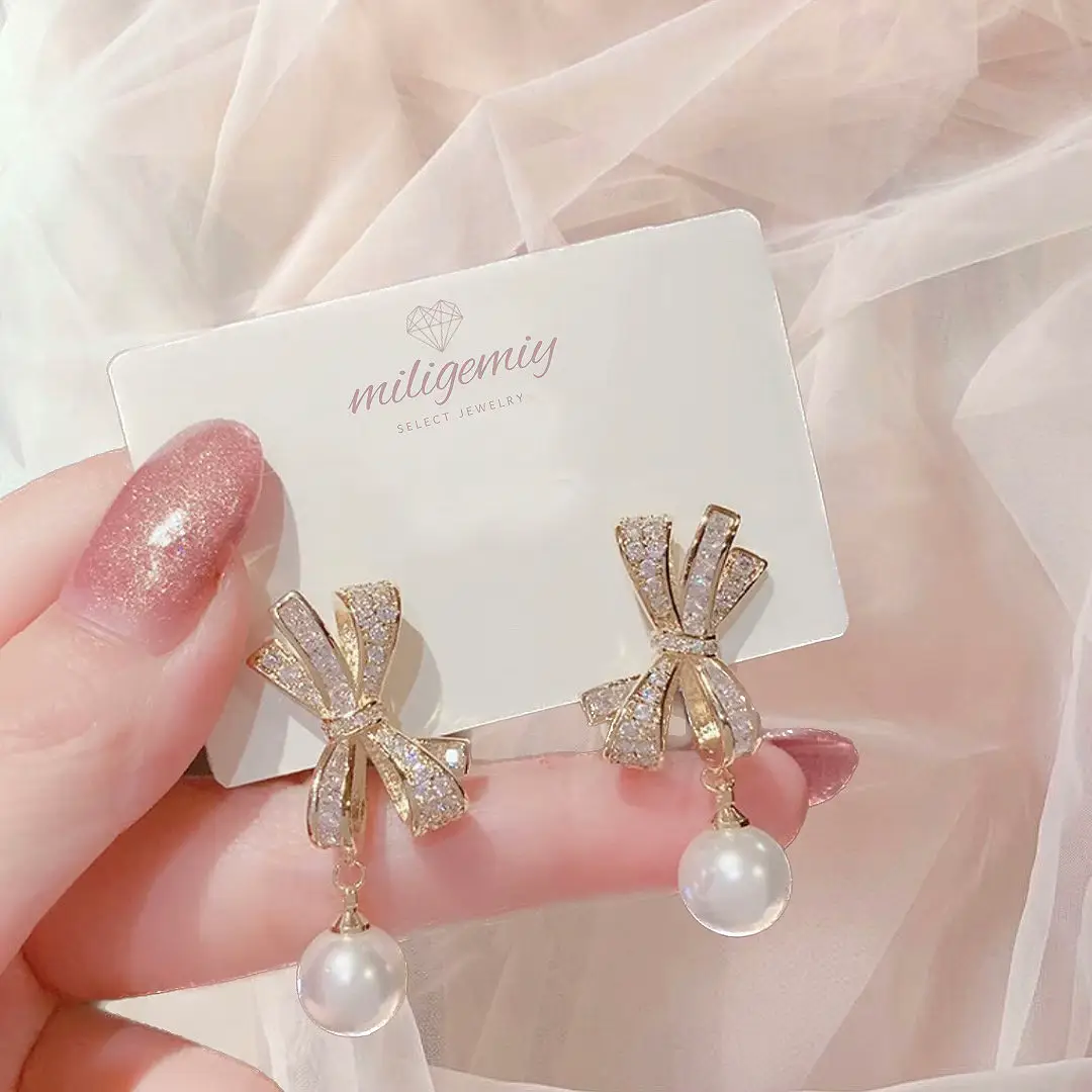 高級感あるリボンパールピアス 🎀✨ | miligemiyが投稿したフォトブック | Lemon8