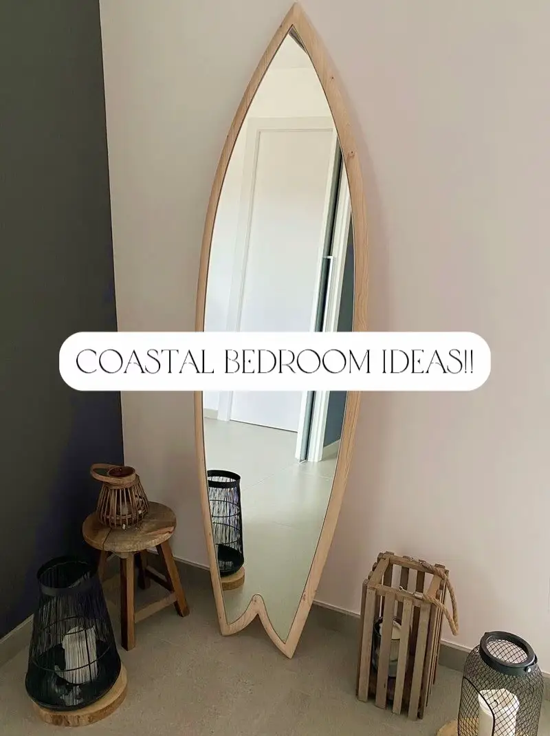  A mirror with a wooden surfboard on it.