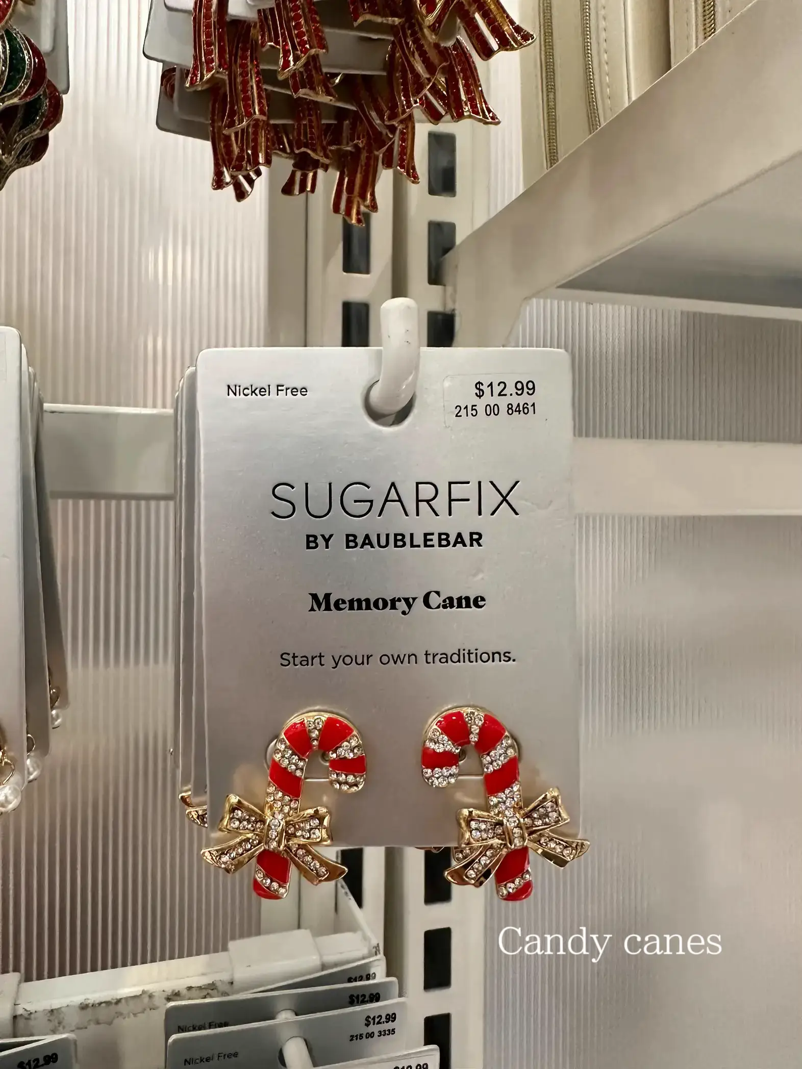  A shelf with a sign that says "Sugar Fix" by Bauble Bar
