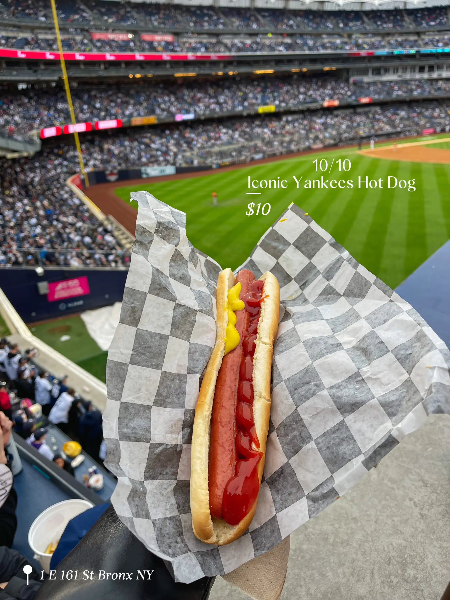  A Yankees hot dog in a bun with a price of $10.