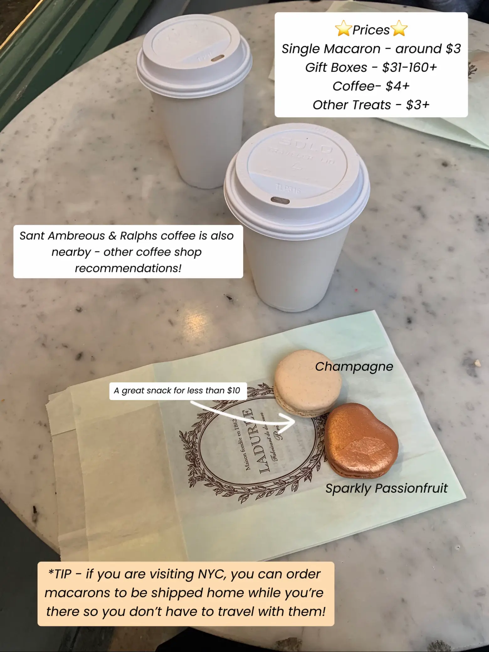  A table with a cup of coffee, a macaron, and a gift box.