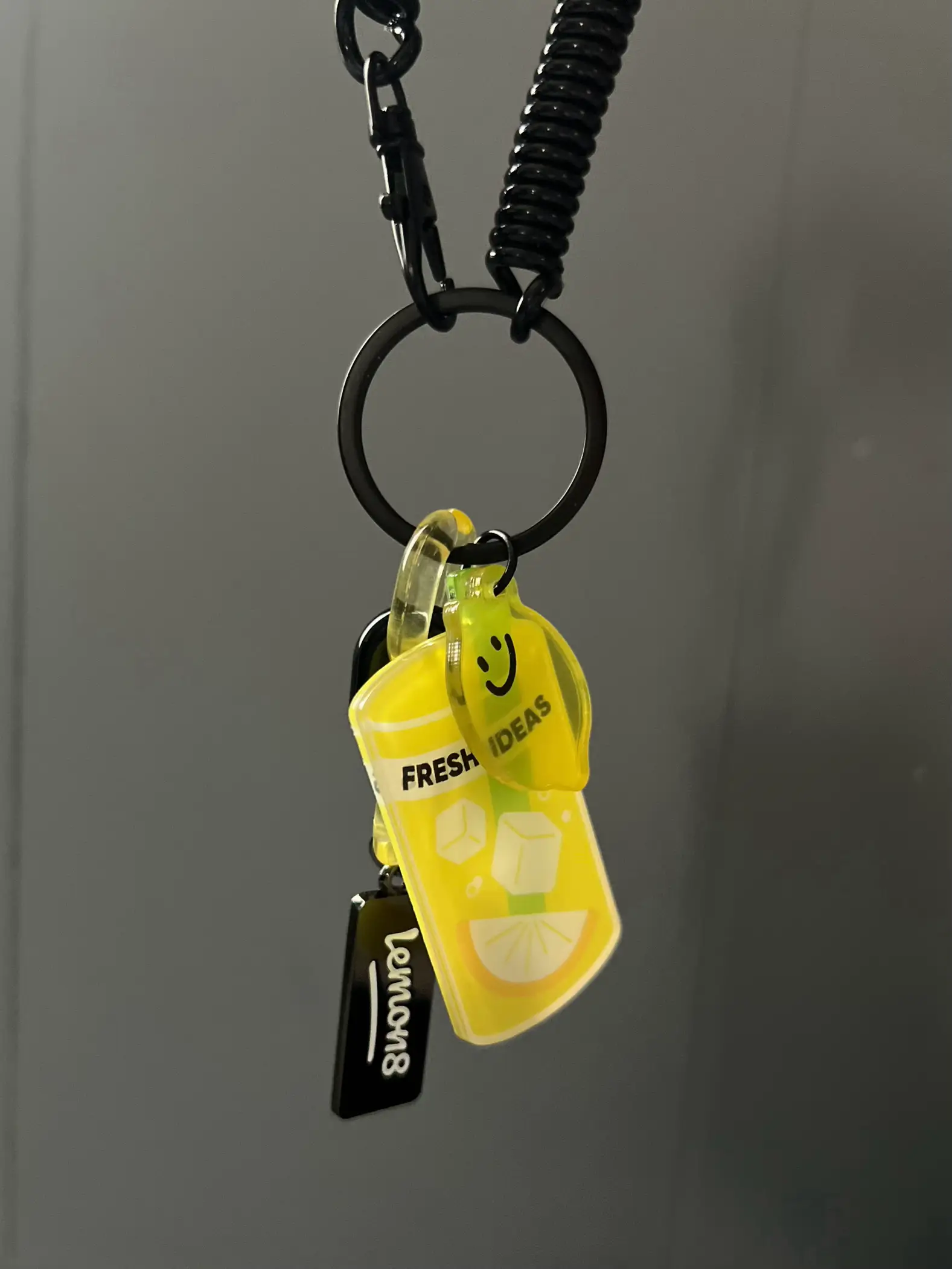 A keychain with a lemon on it.