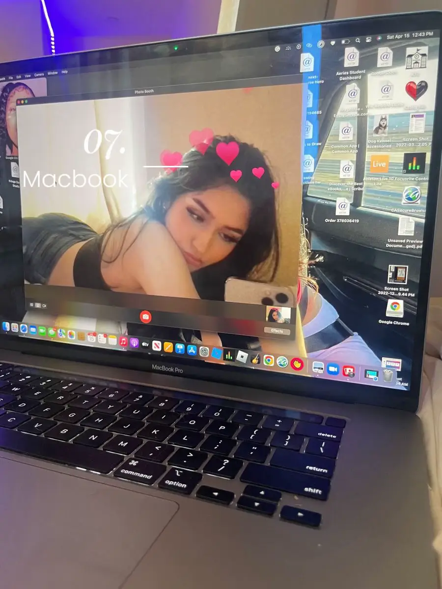  A laptop screen with a woman on it.
