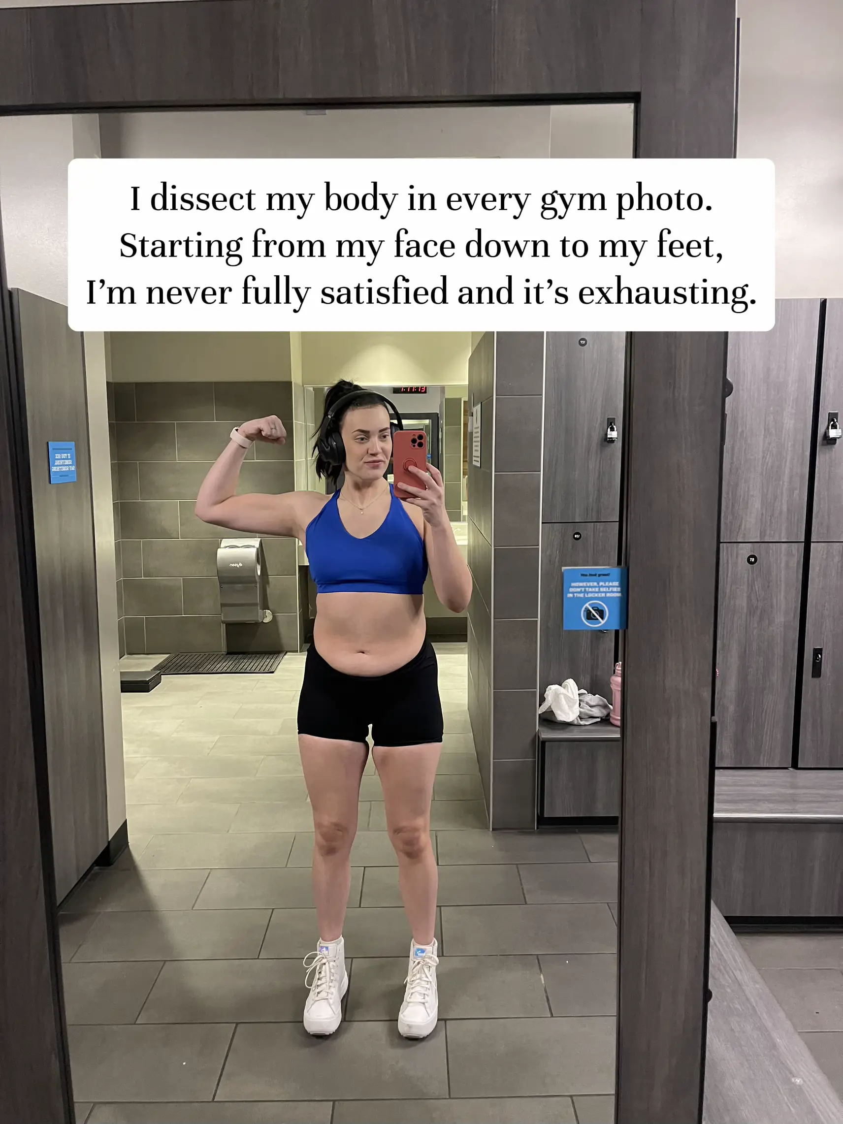  A woman in a gym taking a selfie.