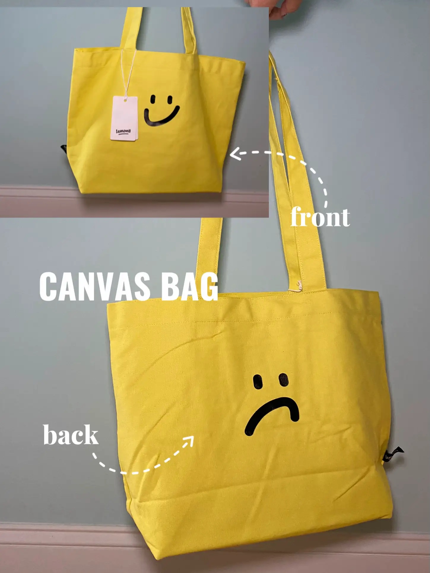  A green canvas bag with a smiley face on it.