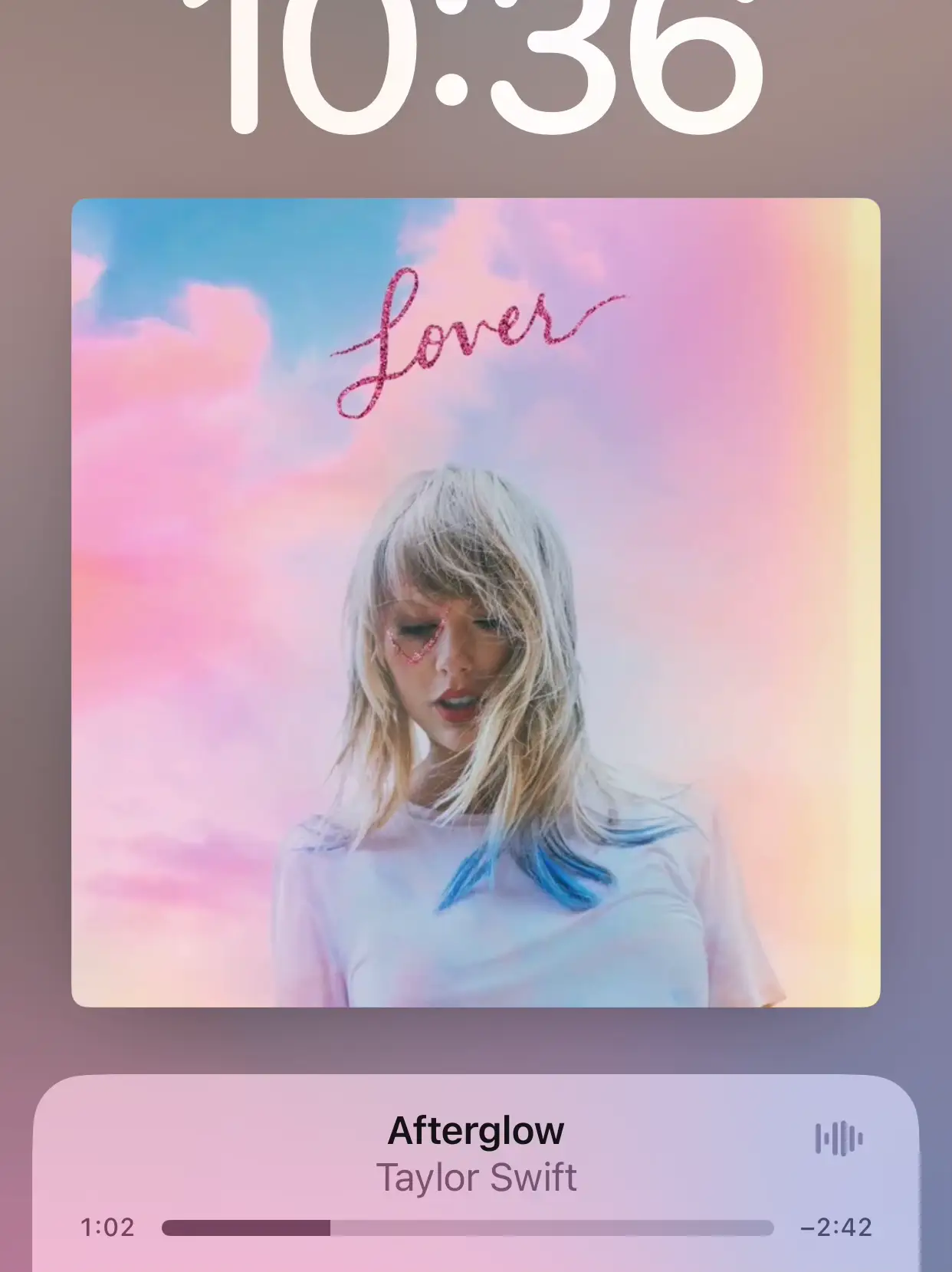  A phone screen displaying a Taylor Swift song.