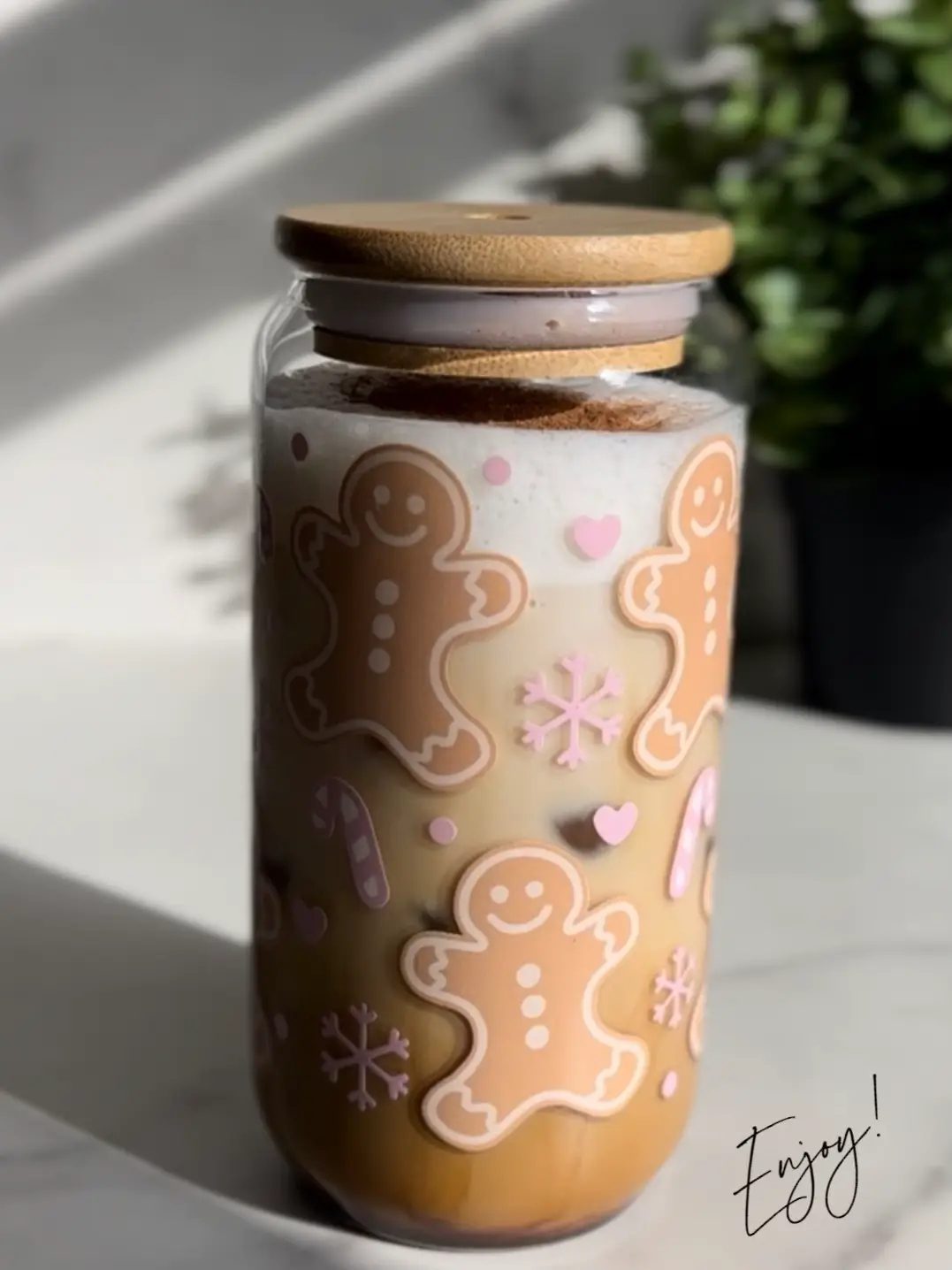  A jar with a snowman on it.